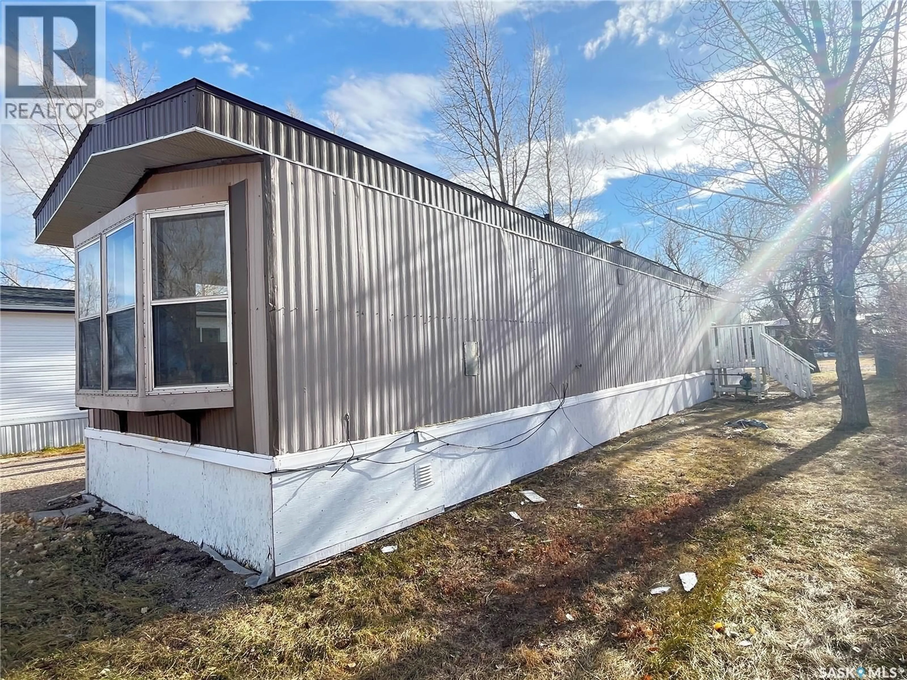 Home with vinyl exterior material, building for CYPRESS MOBILE HOME PARK, Maple Creek Saskatchewan S0N1N0