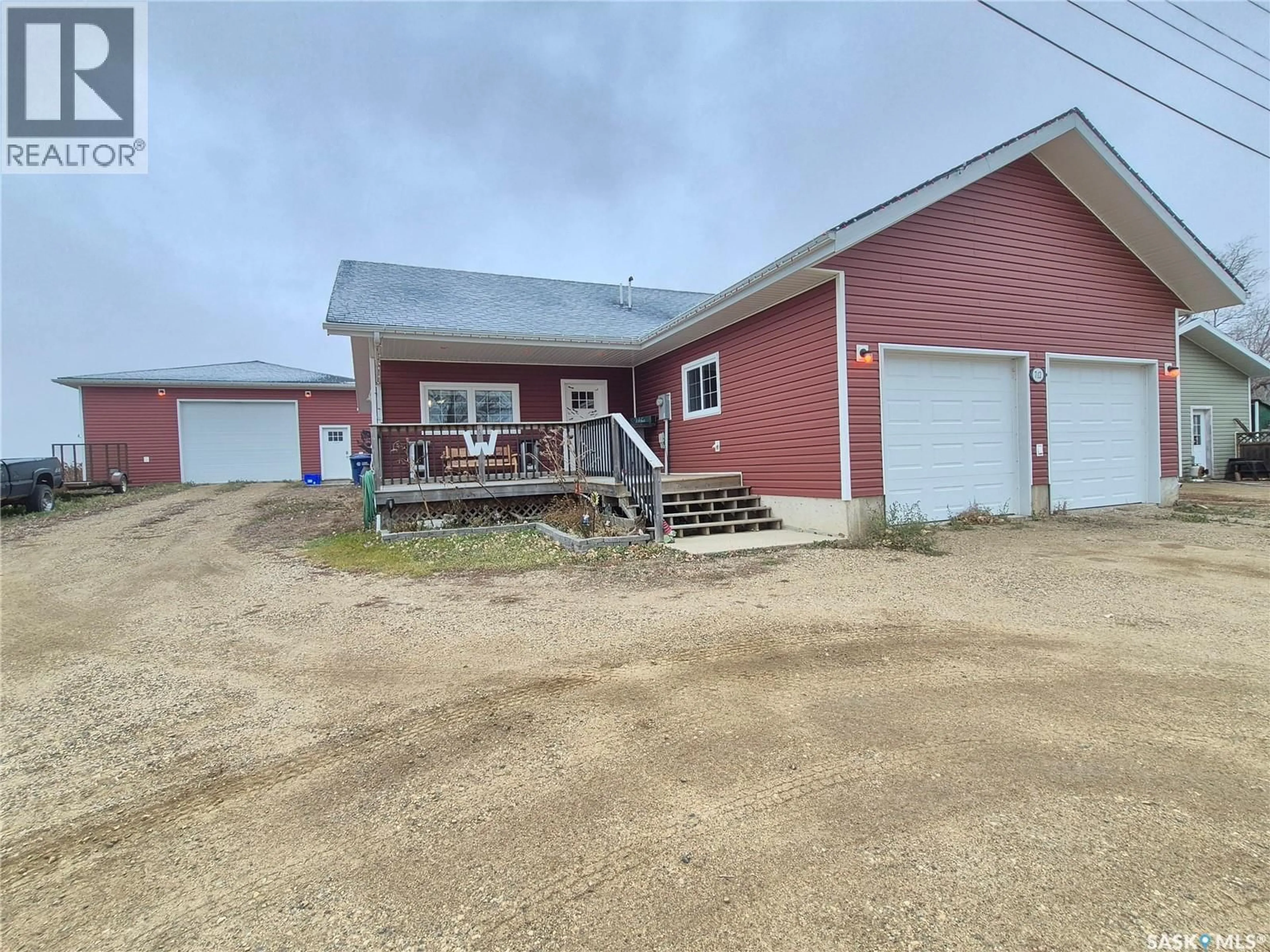 A pic from outside/outdoor area/front of a property/back of a property/a pic from drone, building for 712 RAILWAY AVENUE, Pangman Saskatchewan S0C2C0