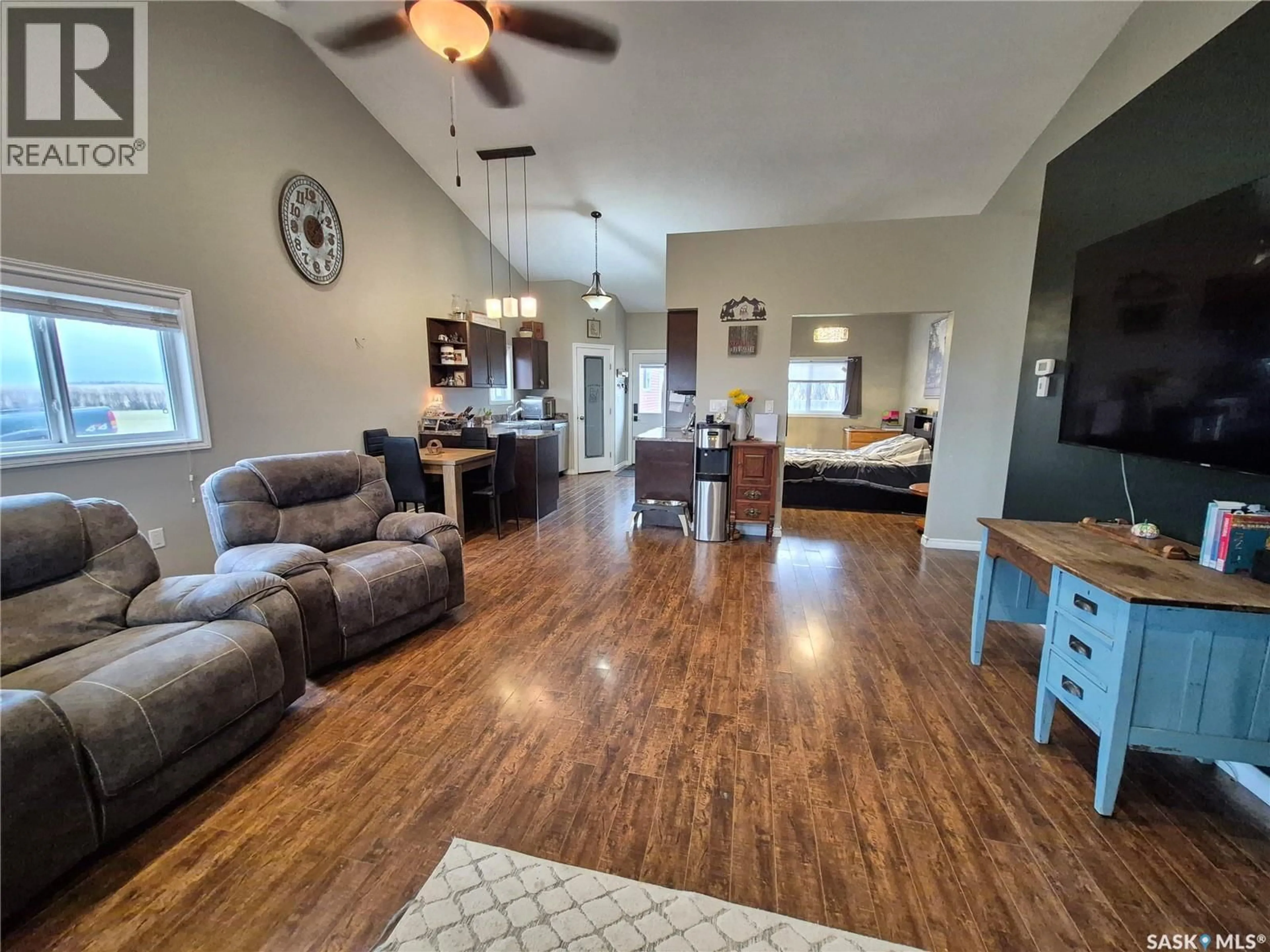 Living room with furniture, wood/laminate floor for 712 RAILWAY AVENUE, Pangman Saskatchewan S0C2C0