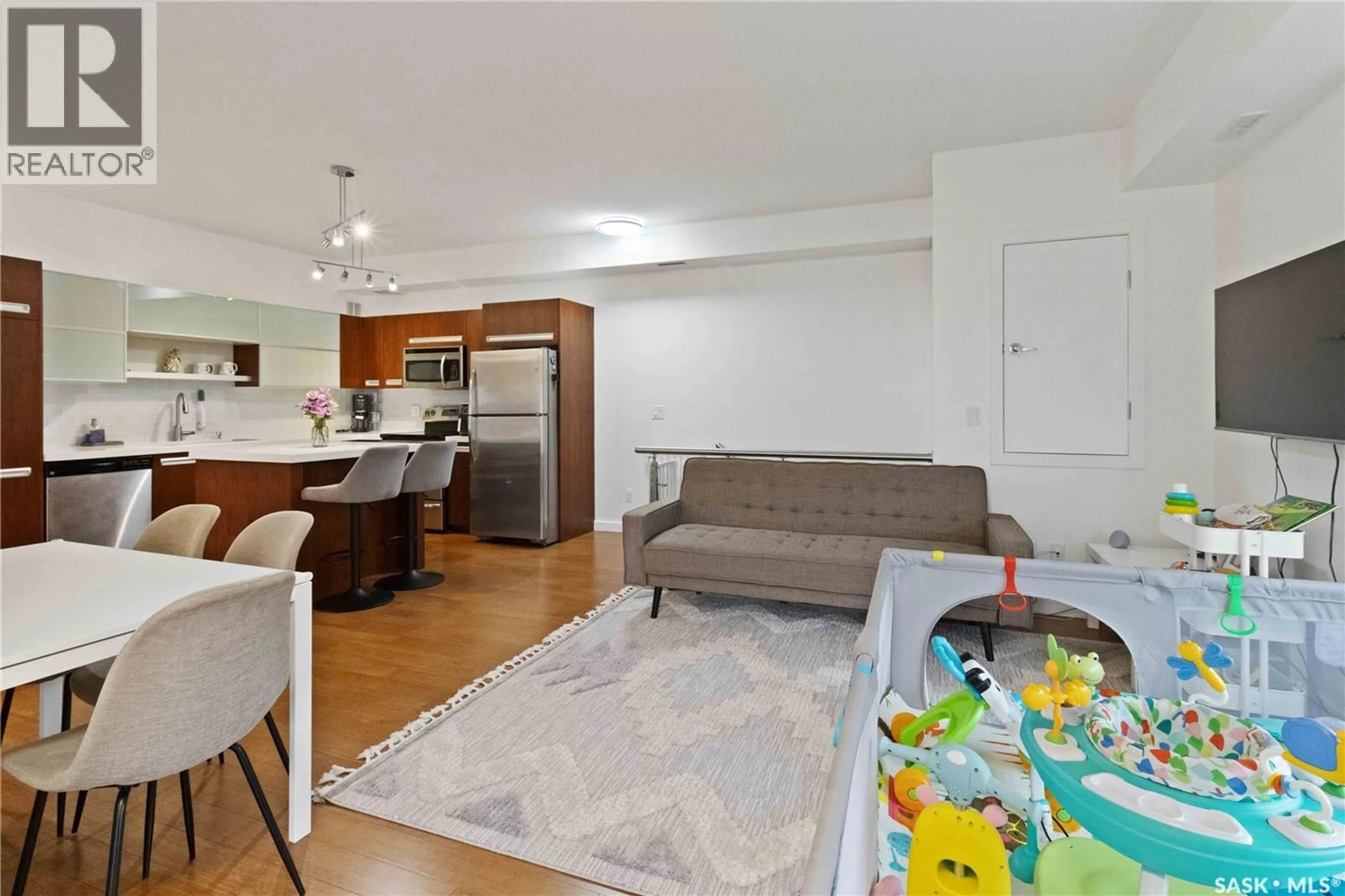 Living room with furniture, unknown for 202 1015 PATRICK CRESCENT, Saskatoon Saskatchewan S7W0M6