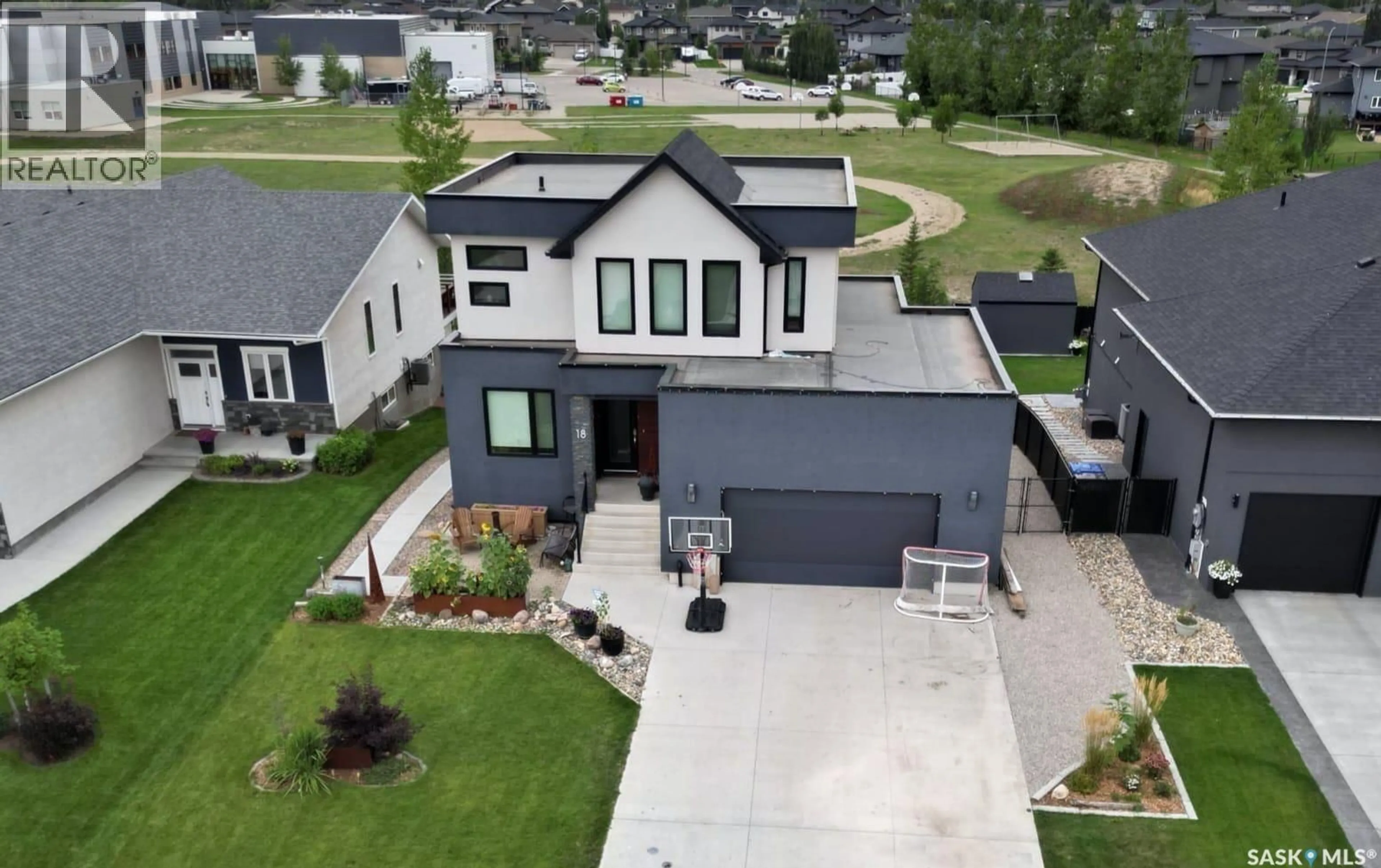A pic from outside/outdoor area/front of a property/back of a property/a pic from drone, street for 18 PRINCETON DRIVE, White City Saskatchewan S4L0C8