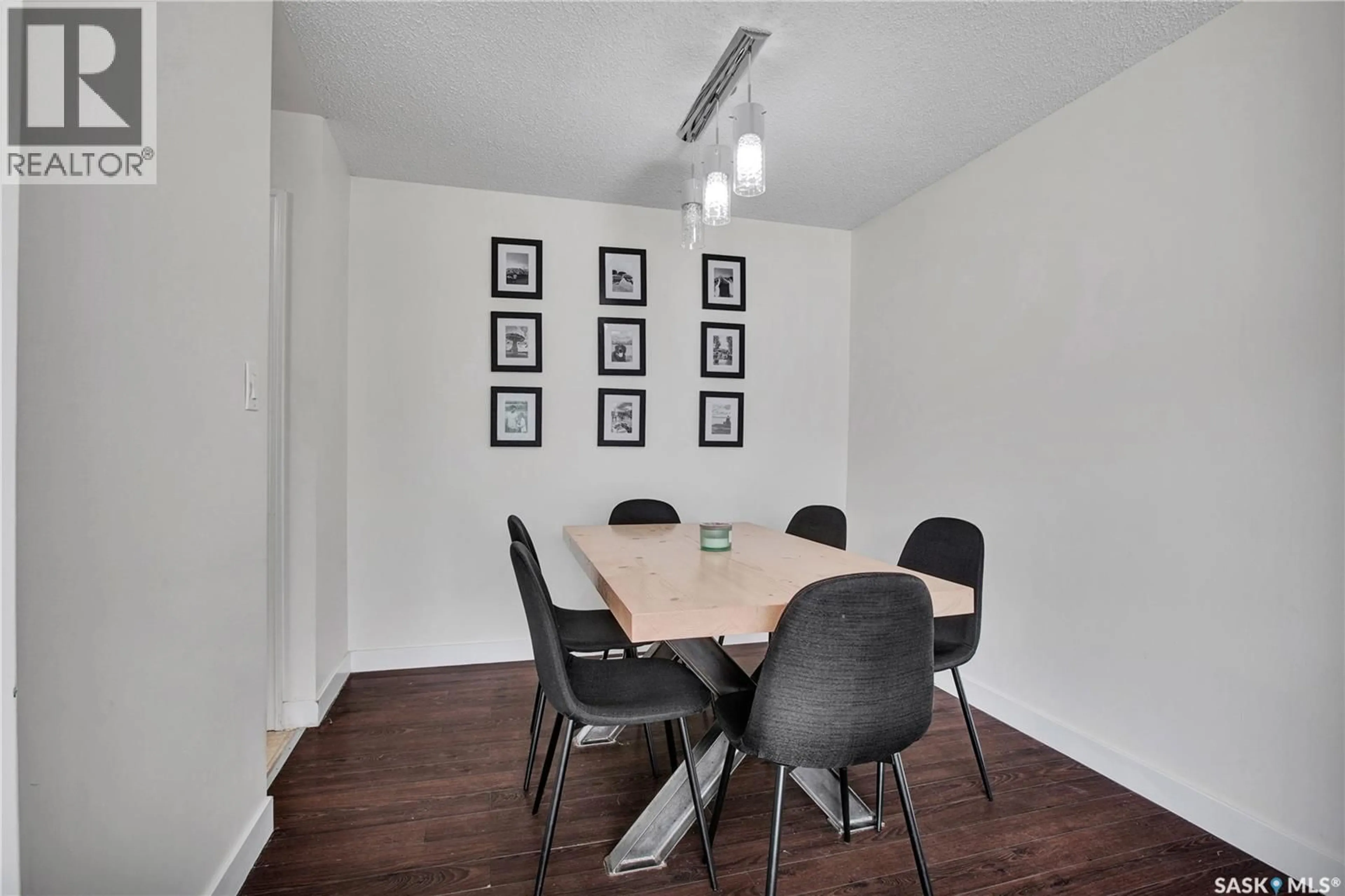 Dining room, wood/laminate floor for 2616 CLARENCE AVENUE, Saskatoon Saskatchewan S7J1M6
