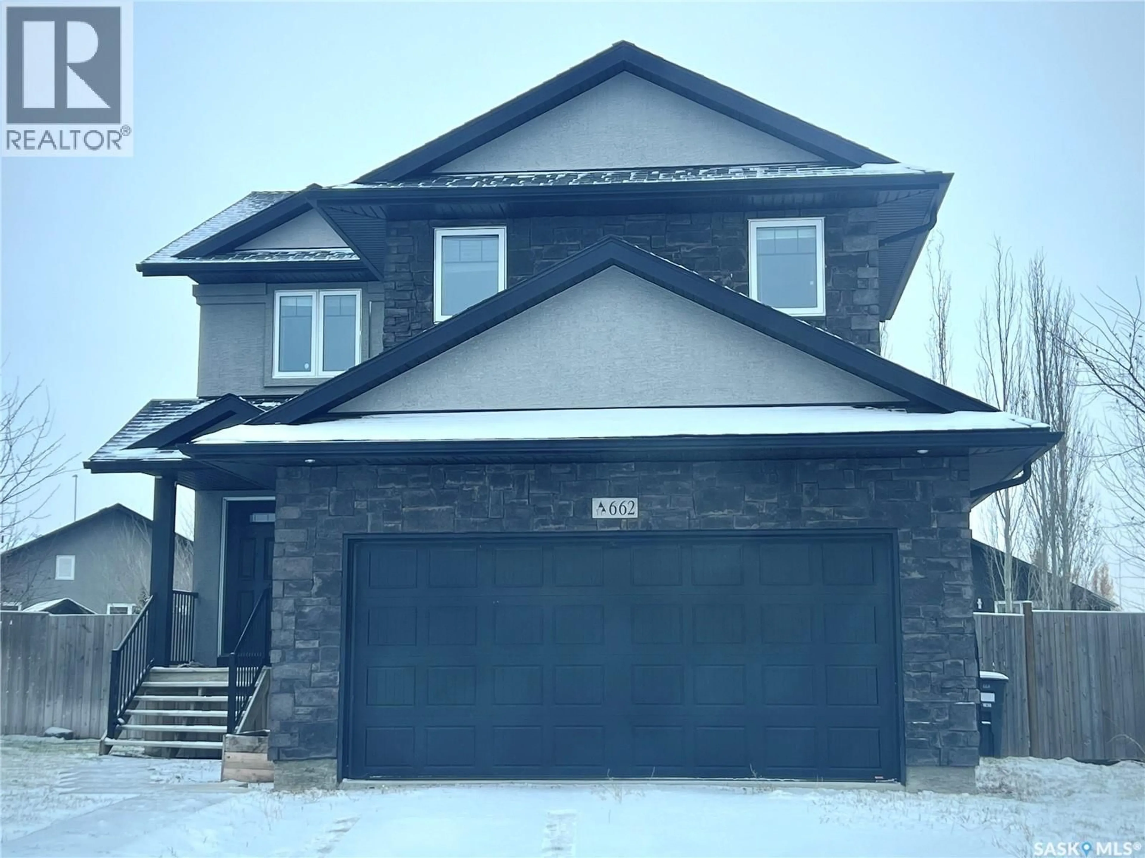 Home with brick exterior material, street for 662 SUTTER BAY, Saskatoon Saskatchewan S7T0R5