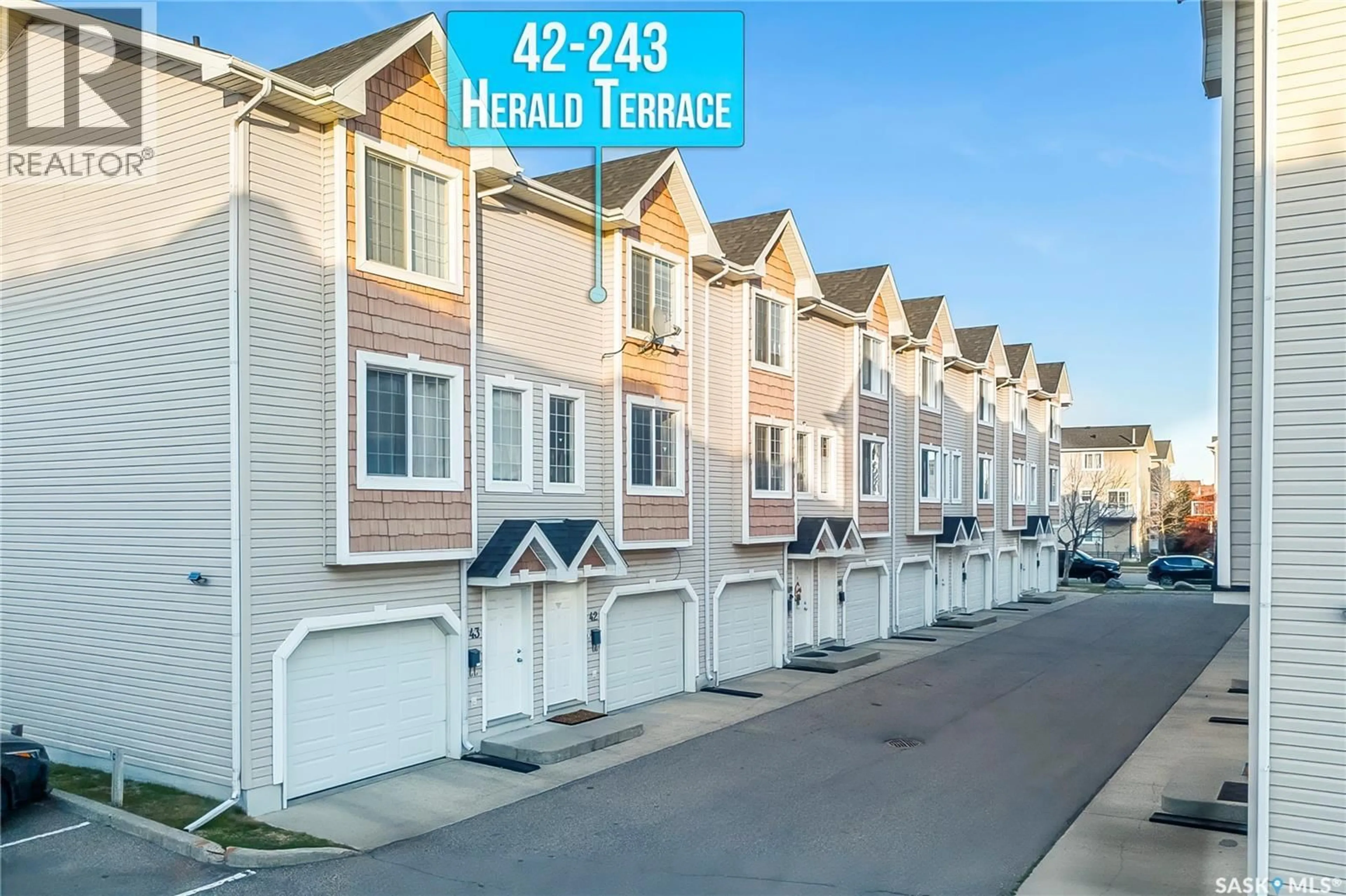A pic from outside/outdoor area/front of a property/back of a property/a pic from drone, street for 42 243 HEROLD TERRACE, Saskatoon Saskatchewan S7V1J5