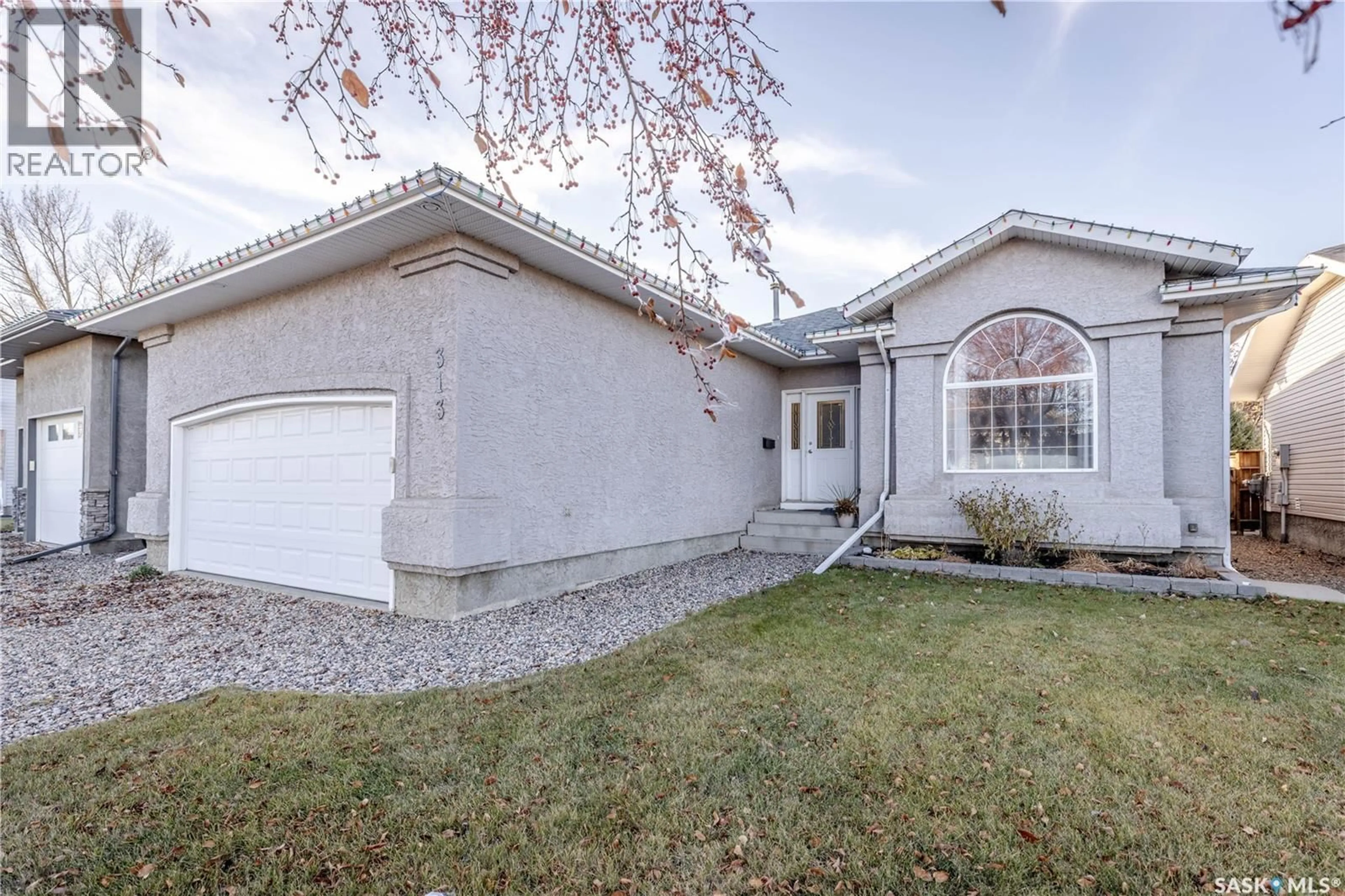 Home with vinyl exterior material, street for 313 VICTOR LANE, Dalmeny Saskatchewan S0K1E0