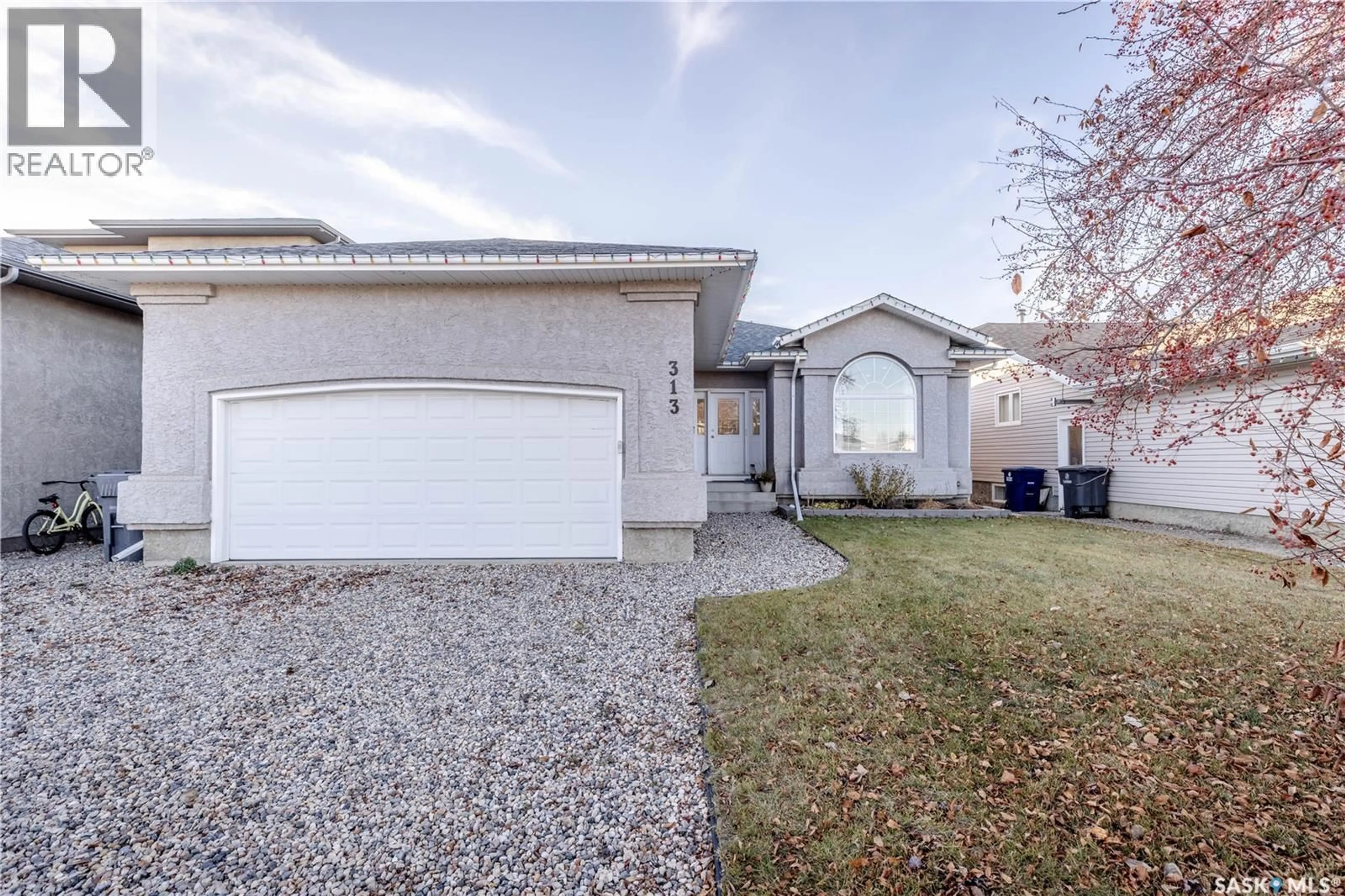 Home with vinyl exterior material, street for 313 VICTOR LANE, Dalmeny Saskatchewan S0K1E0