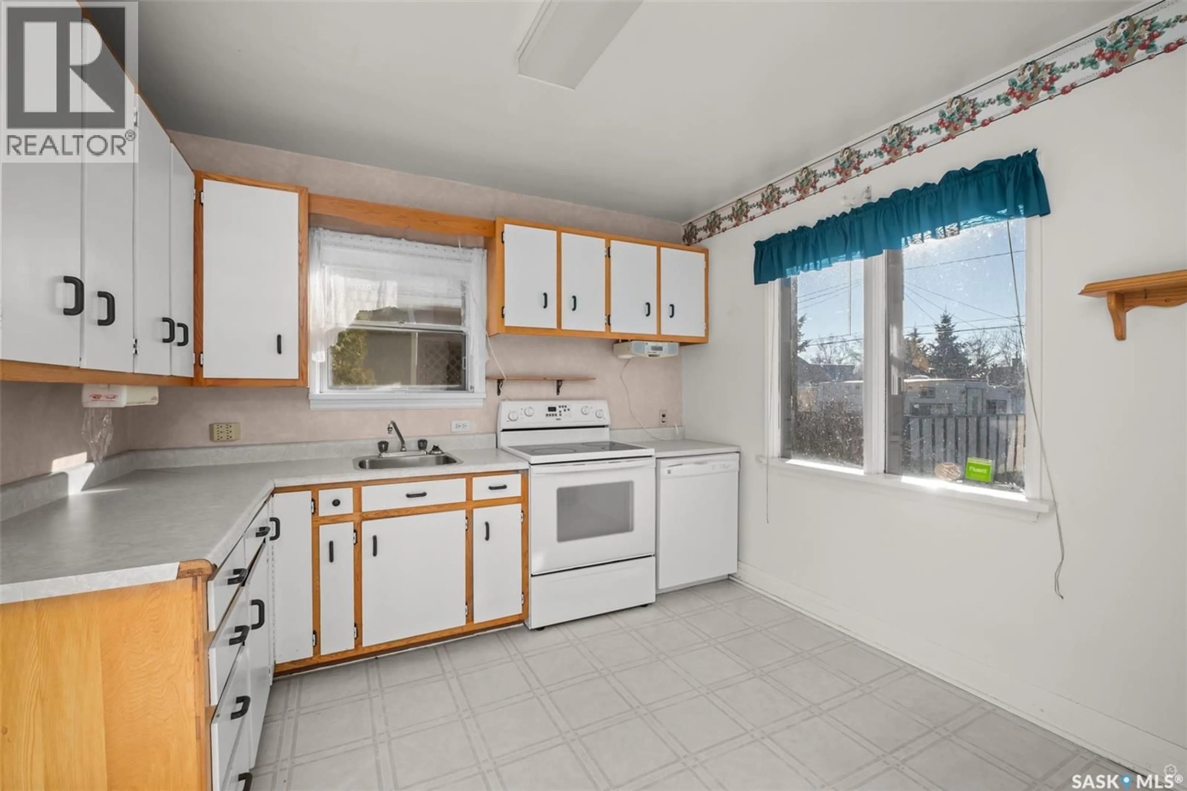 Standard kitchen, ceramic/tile floor for 451 9TH STREET, Prince Albert Saskatchewan S6V0Y1