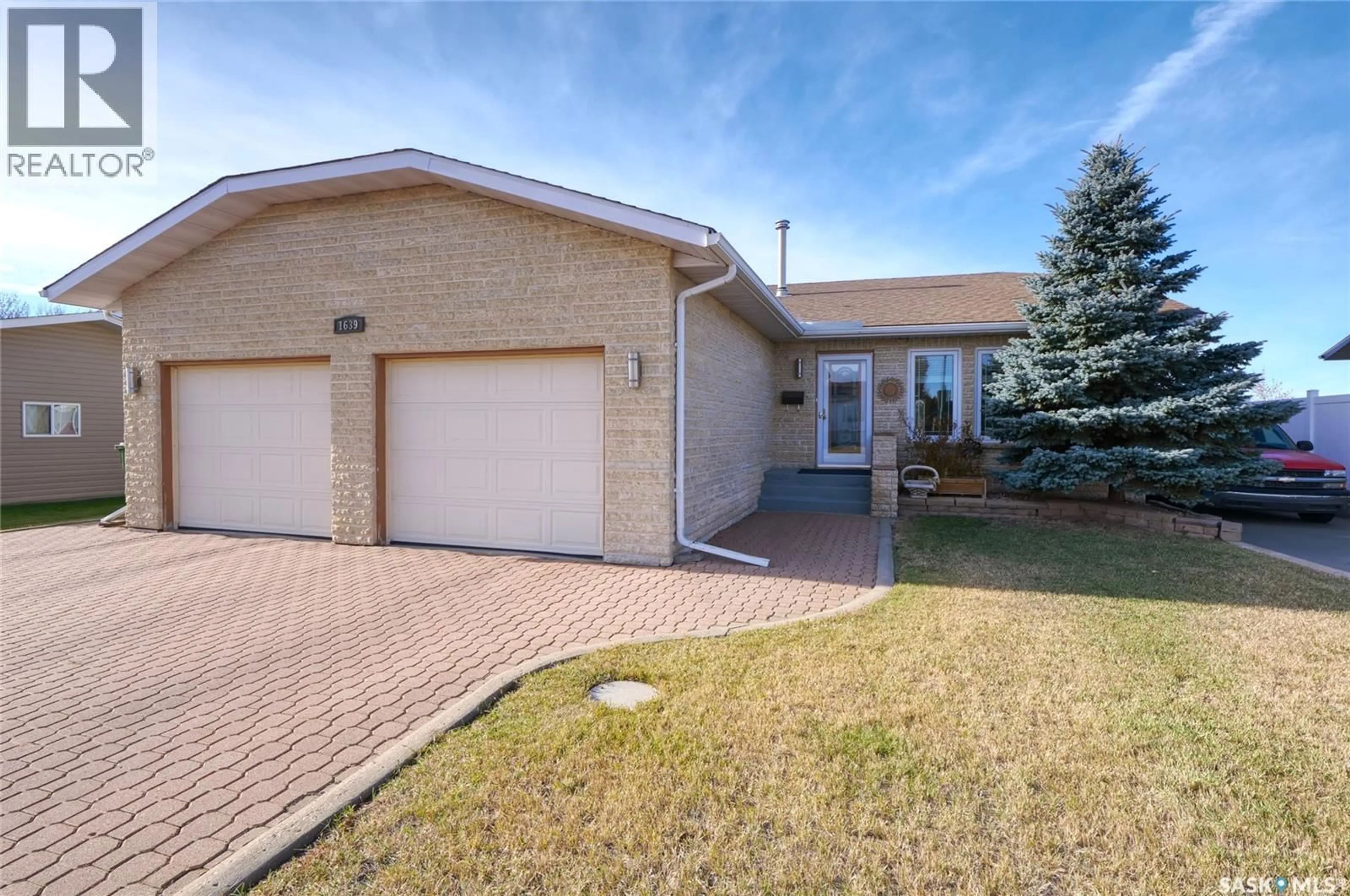 Home with brick exterior material, street for 1639 BINGHAM ROAD, Moose Jaw Saskatchewan S6H7R8
