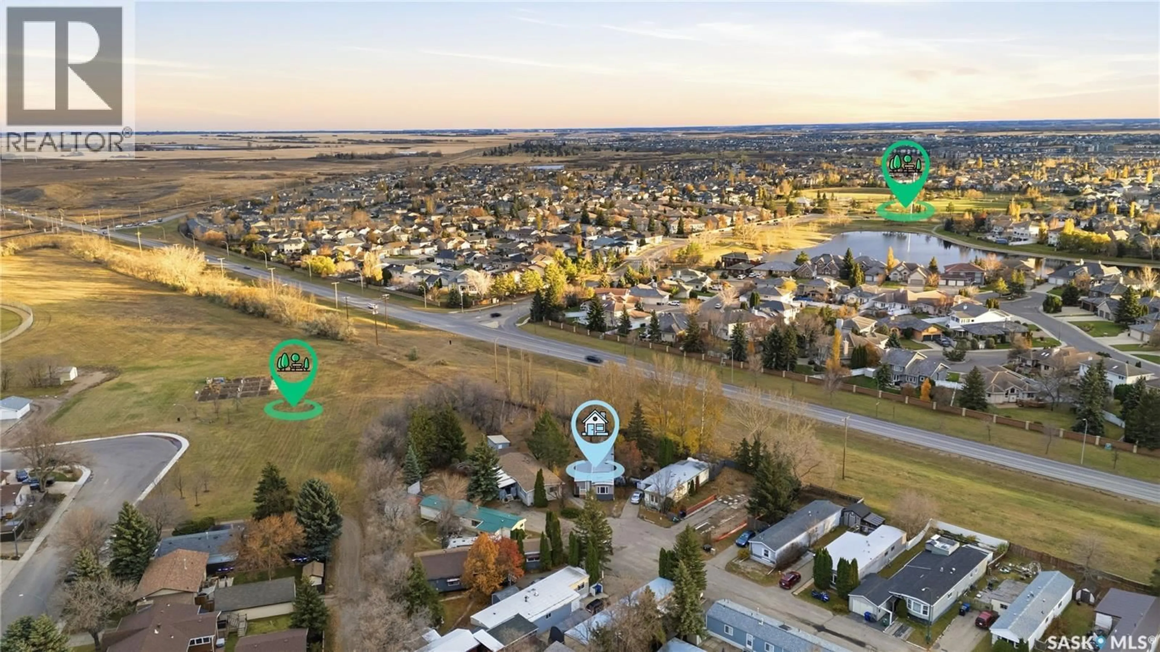 A pic from outside/outdoor area/front of a property/back of a property/a pic from drone, street for 60 1035 BOYCHUK DRIVE, Saskatoon Saskatchewan S7H5B2