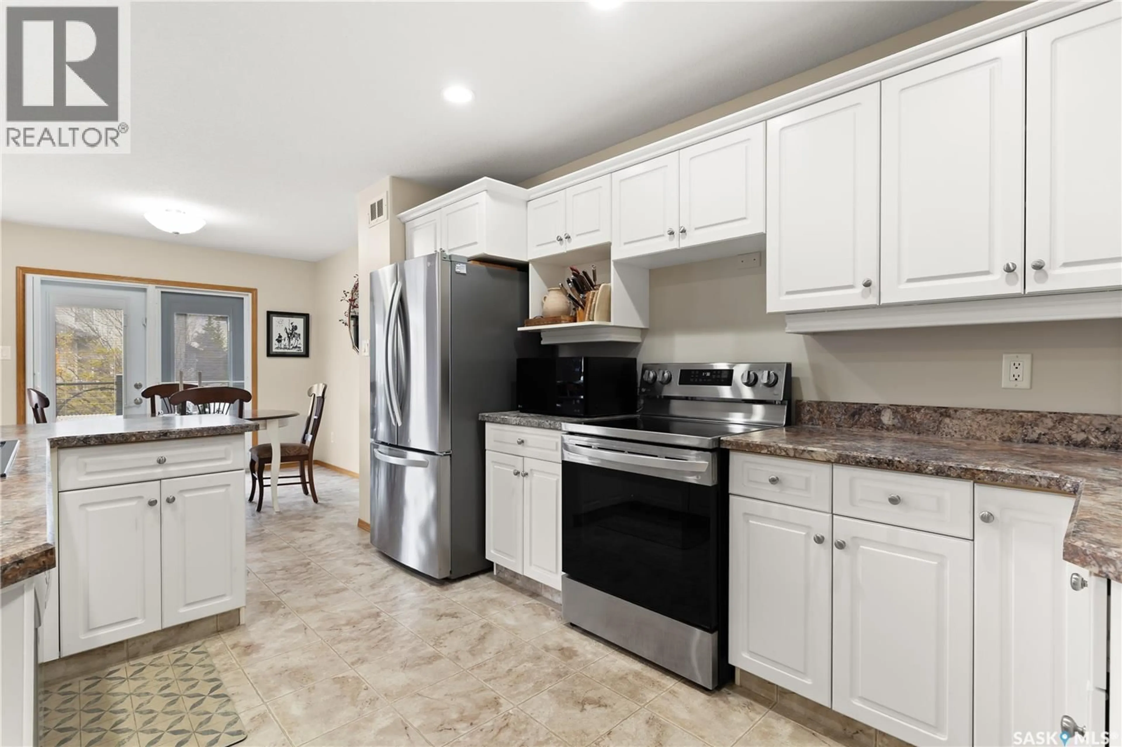 Open concept kitchen, ceramic/tile floor for 3807 CREEKSIDE ROAD, Regina Saskatchewan S4N7N3