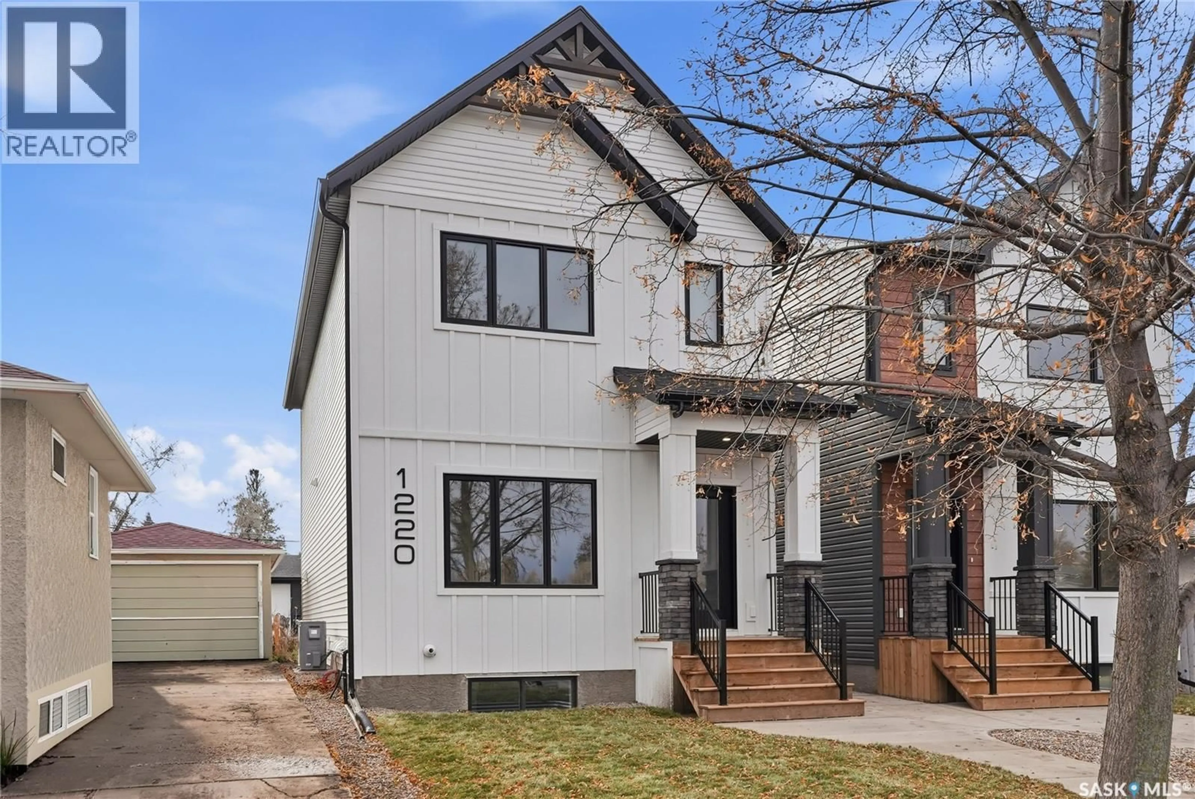 Home with brick exterior material, street for 1220 11TH STREET, Saskatoon Saskatchewan S7H0G3