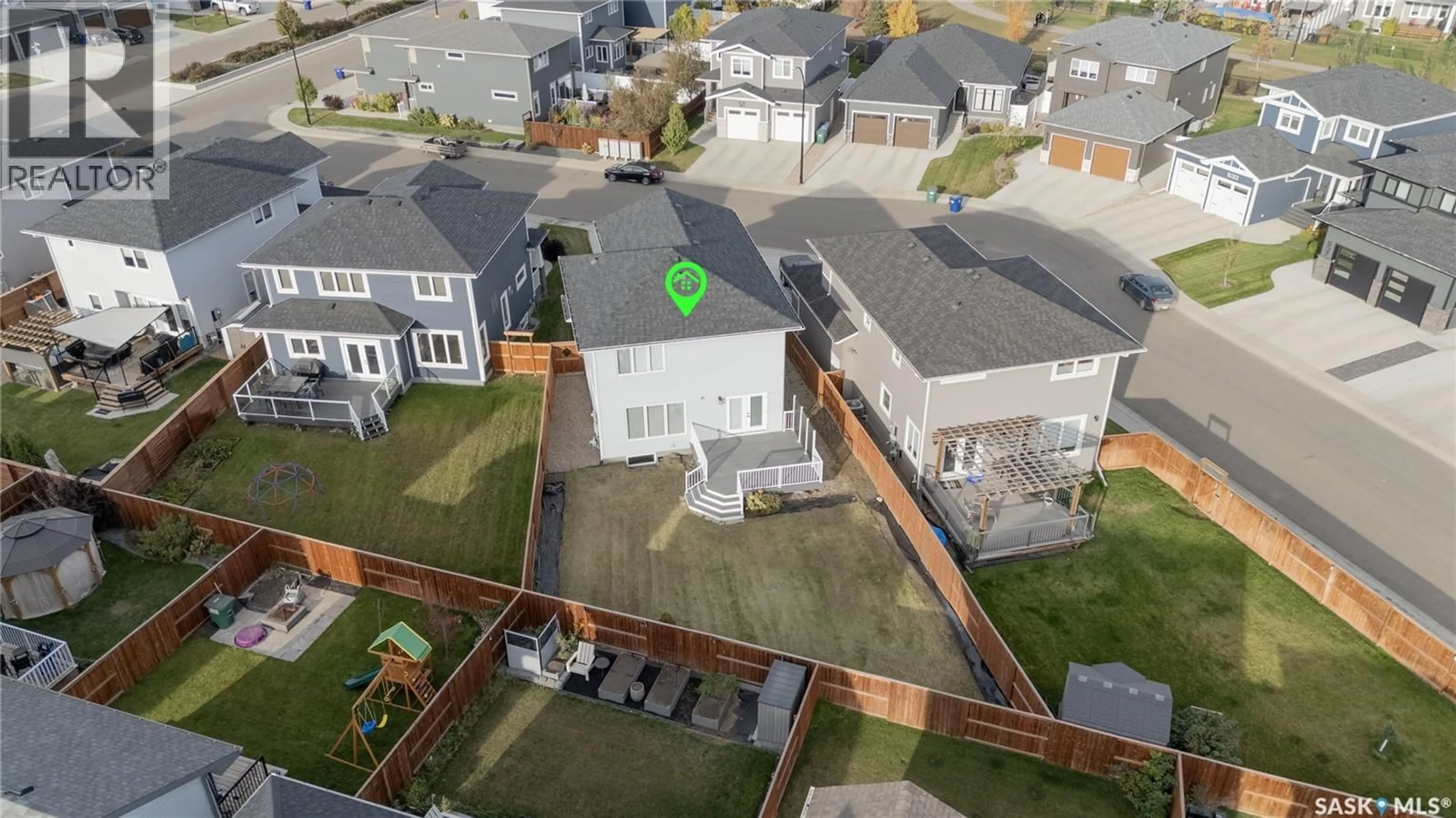 A pic from outside/outdoor area/front of a property/back of a property/a pic from drone, street for 522 DUBOIS MANOR, Saskatoon Saskatchewan S7V0R2