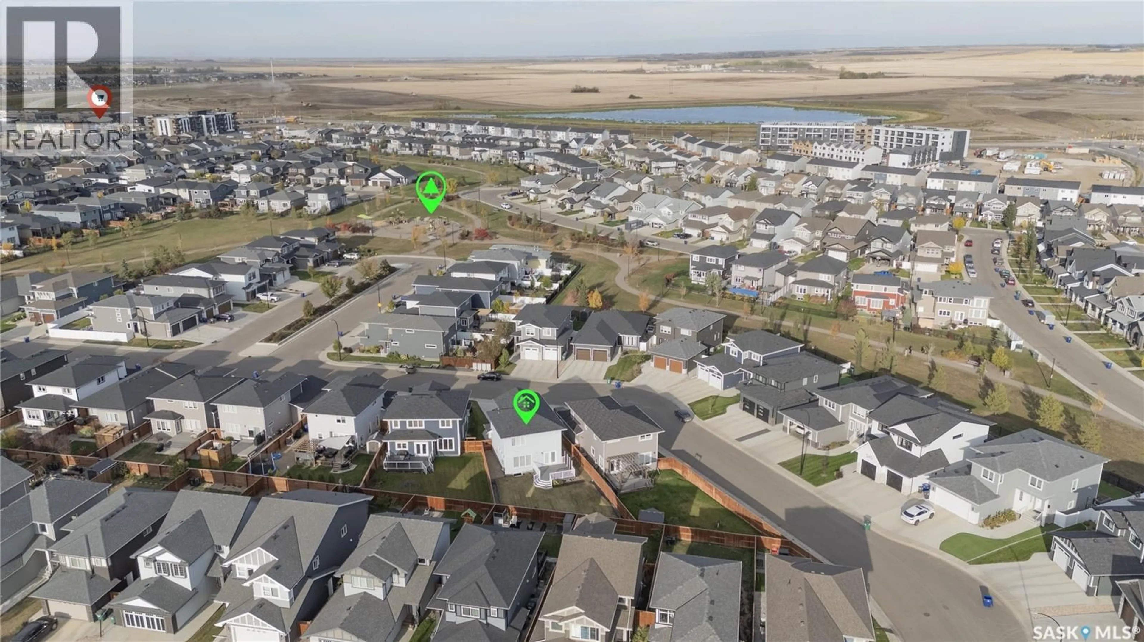 A pic from outside/outdoor area/front of a property/back of a property/a pic from drone, street for 522 DUBOIS MANOR, Saskatoon Saskatchewan S7V0R2