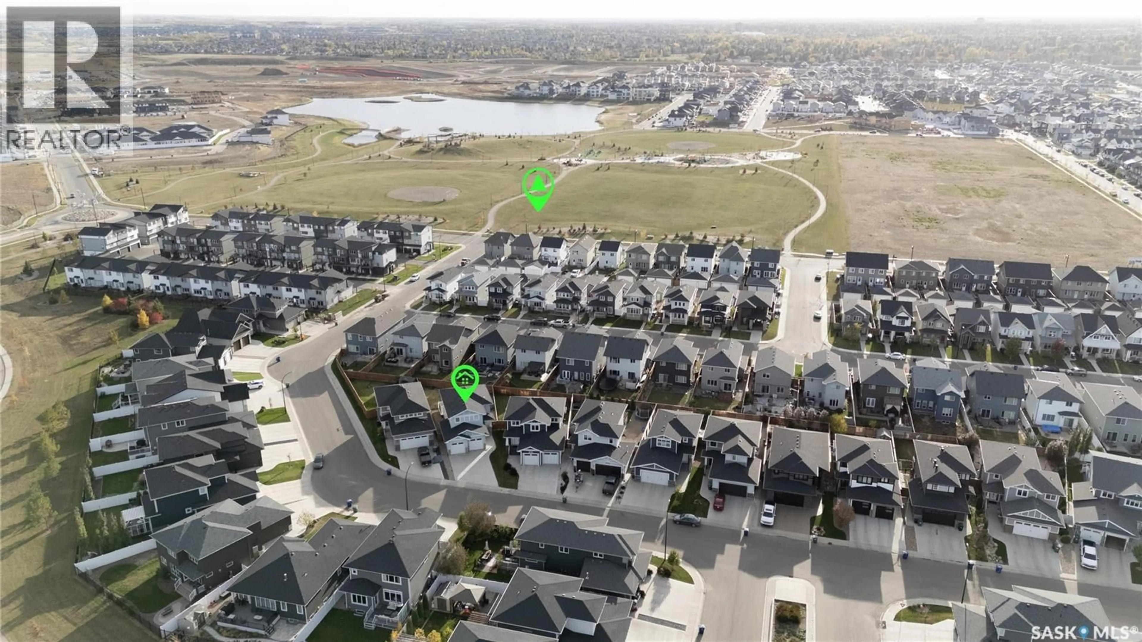 A pic from outside/outdoor area/front of a property/back of a property/a pic from drone, water/lake/river/ocean view for 522 DUBOIS MANOR, Saskatoon Saskatchewan S7V0R2