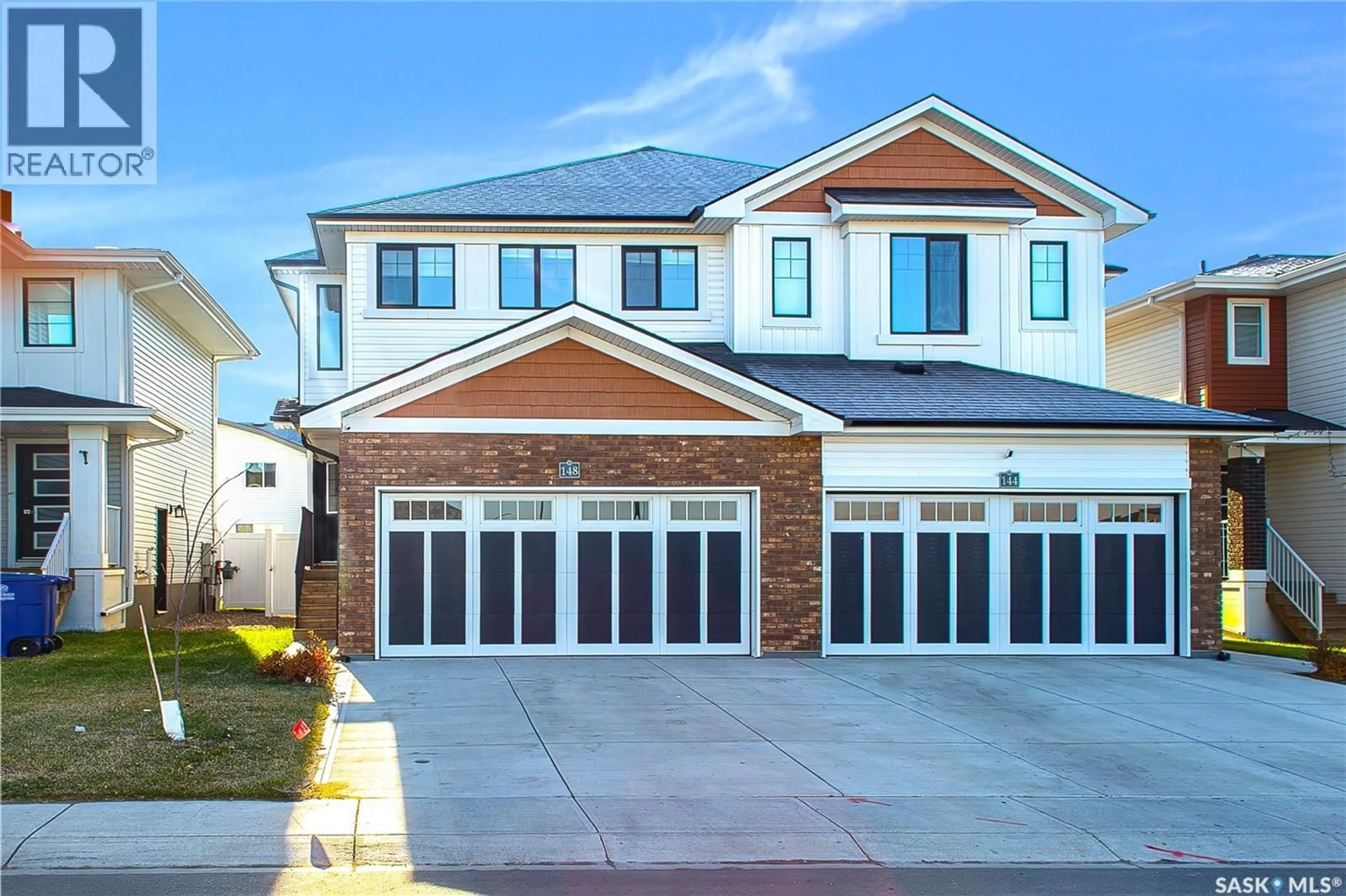 Home with brick exterior material, street for 148 TUFTS WAY, Saskatoon Saskatchewan S7V1P4