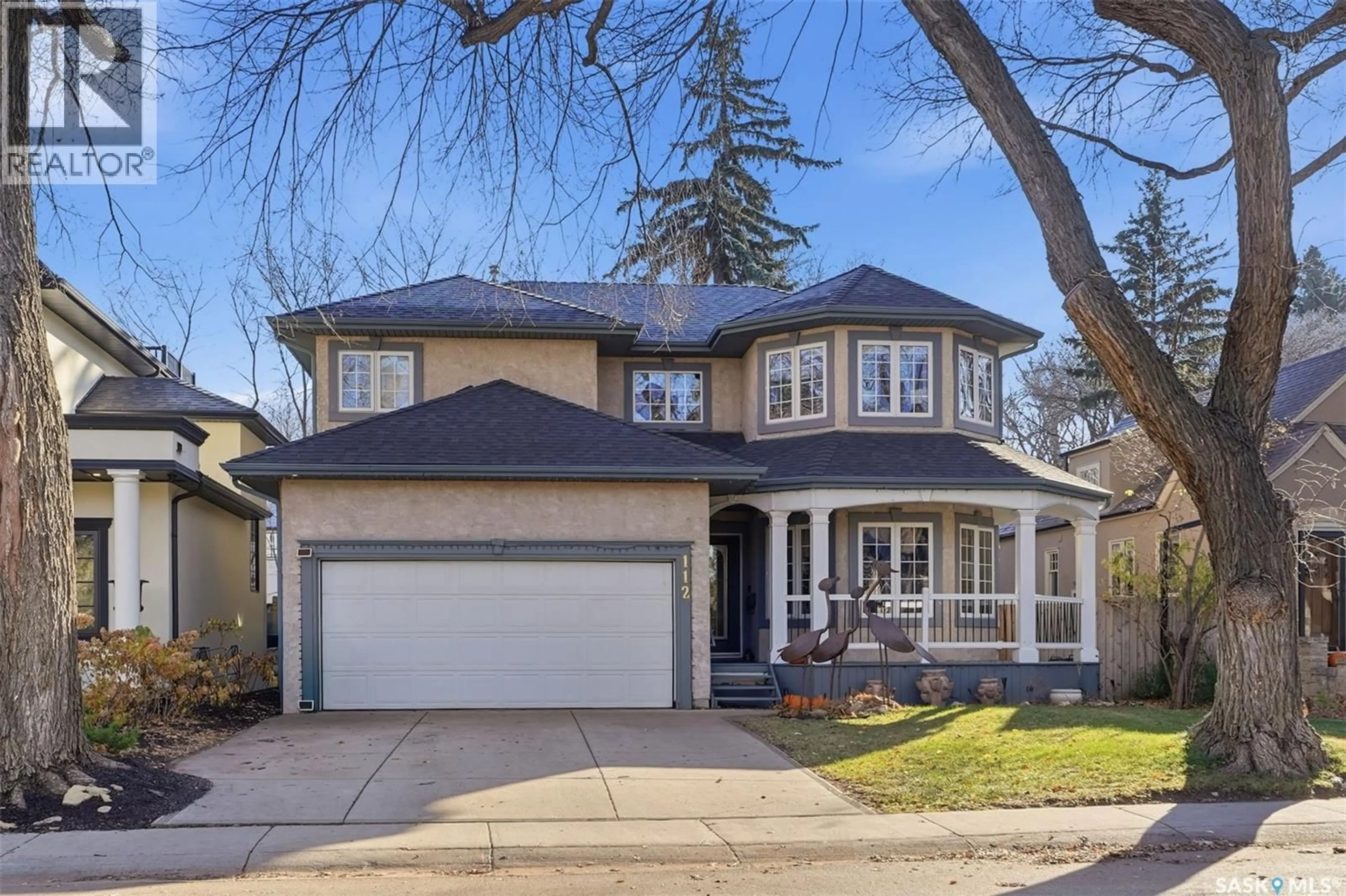 Home with vinyl exterior material, street for 112 SASKATCHEWAN CRESCENT, Saskatoon Saskatchewan S7M0A5