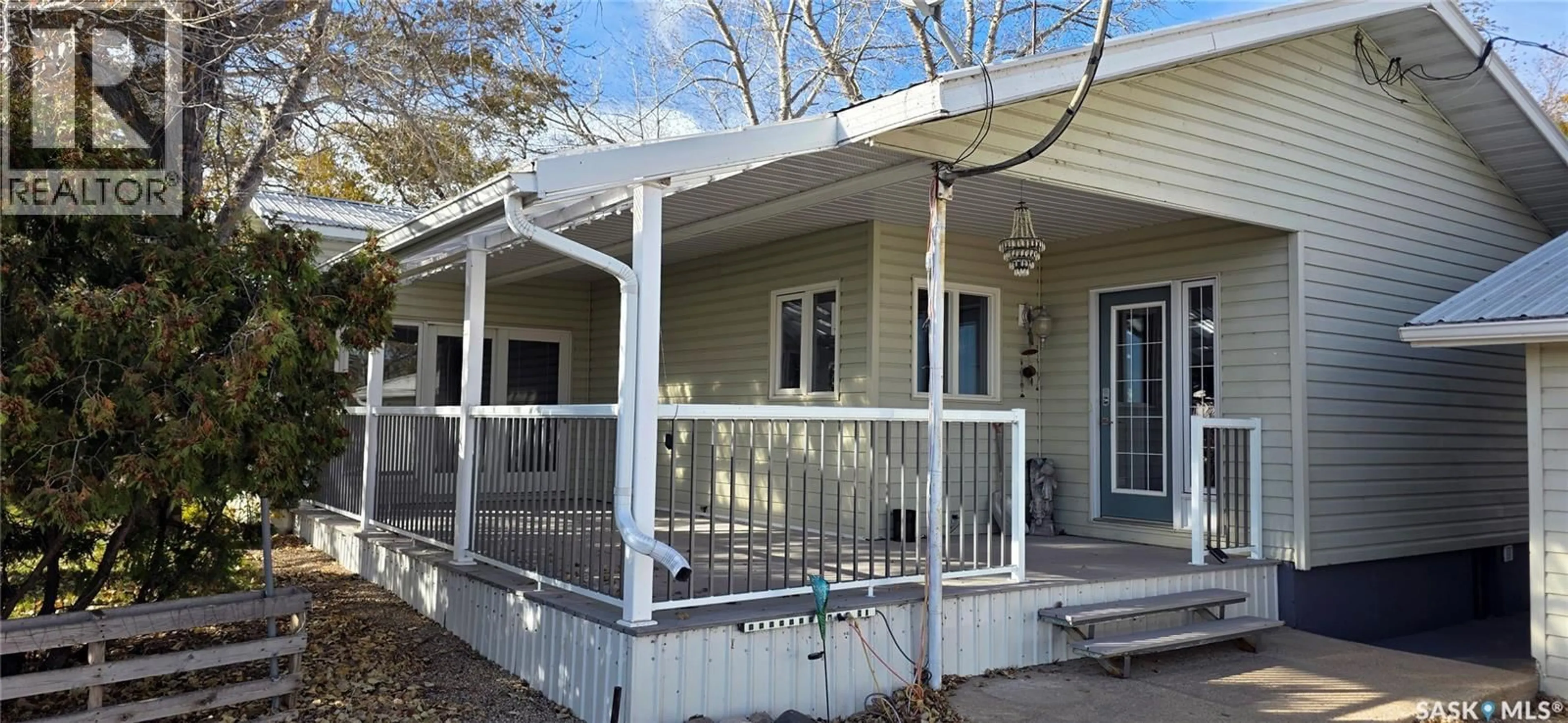 Home with vinyl exterior material, street for KUNTZ ACREAGE, Macoun Saskatchewan S0C1P0