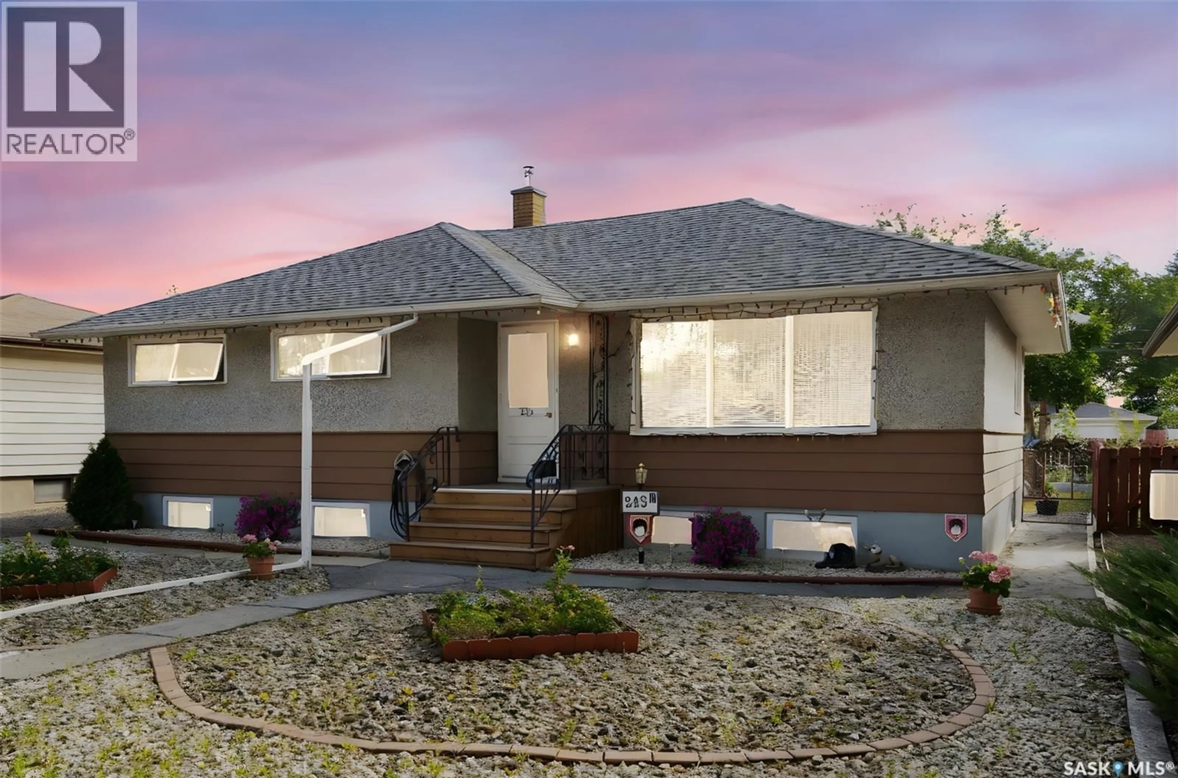 Home with vinyl exterior material, street for 243 MONTREAL STREET, Regina Saskatchewan S4R3T1