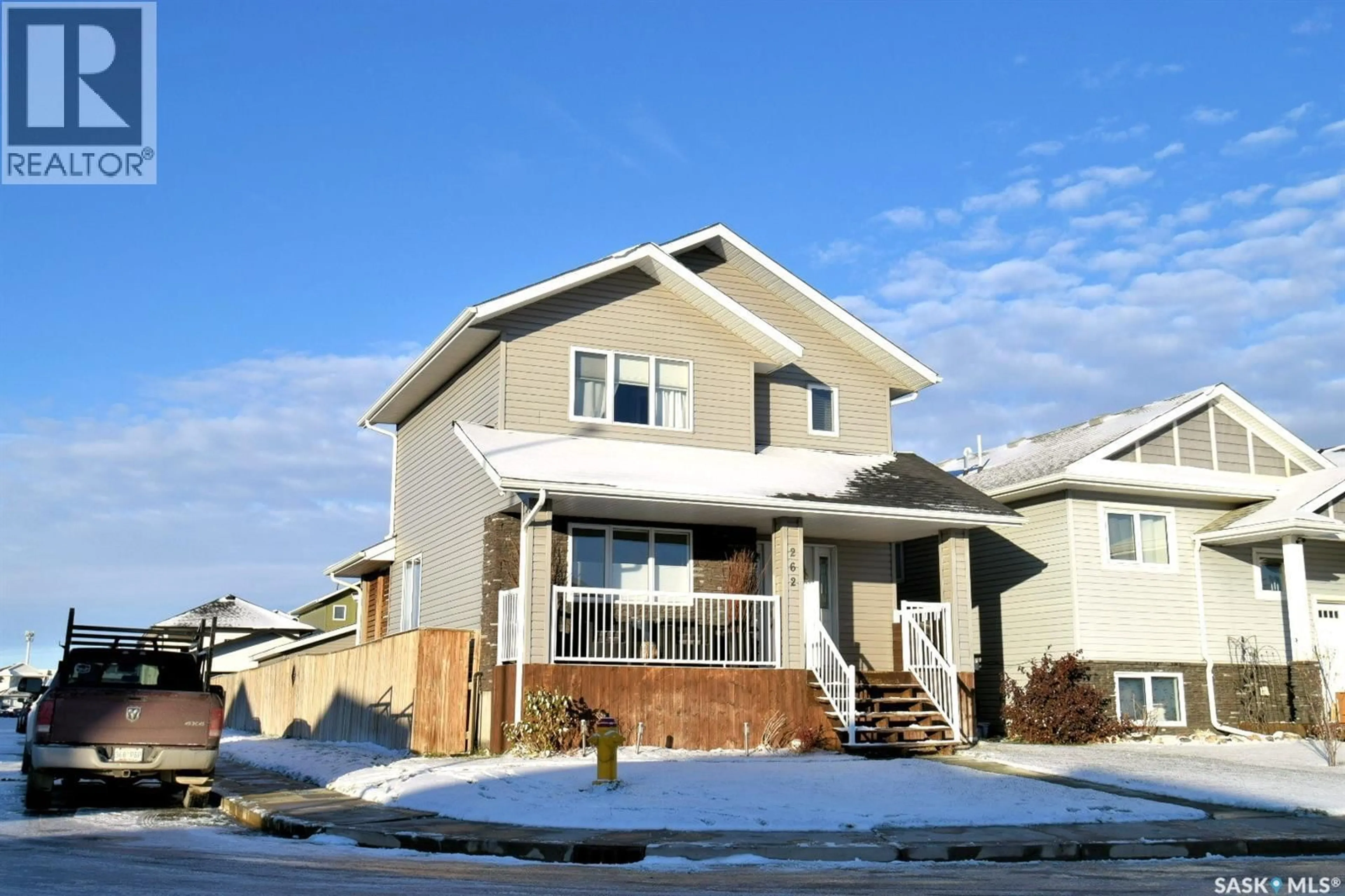 Home with vinyl exterior material, street for 262 ELLS CRESCENT, Saskatoon Saskatchewan S7L6K6