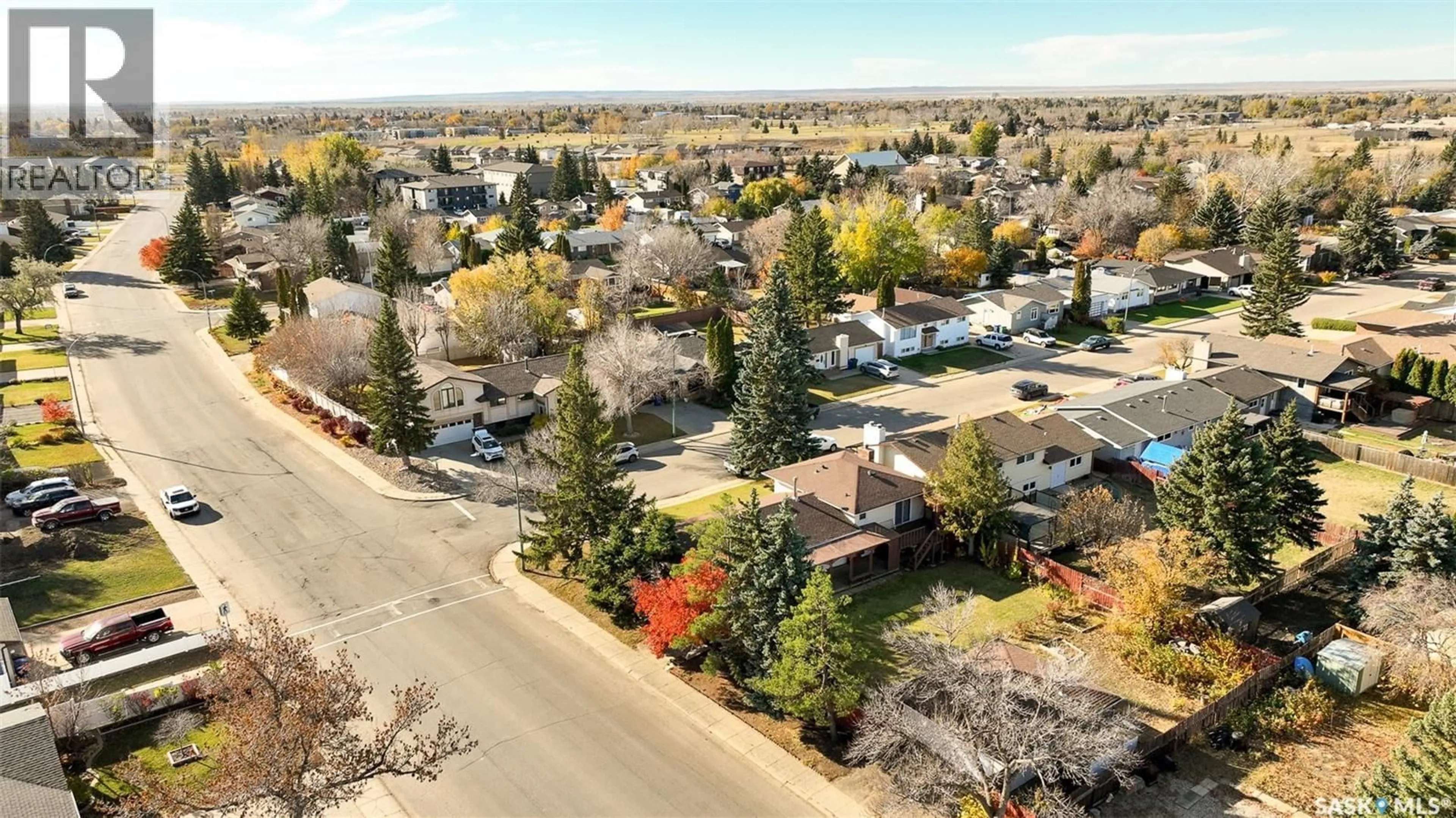 A pic from outside/outdoor area/front of a property/back of a property/a pic from drone, street for 79 BLUEBELL CRESCENT, Moose Jaw Saskatchewan S6J1A2