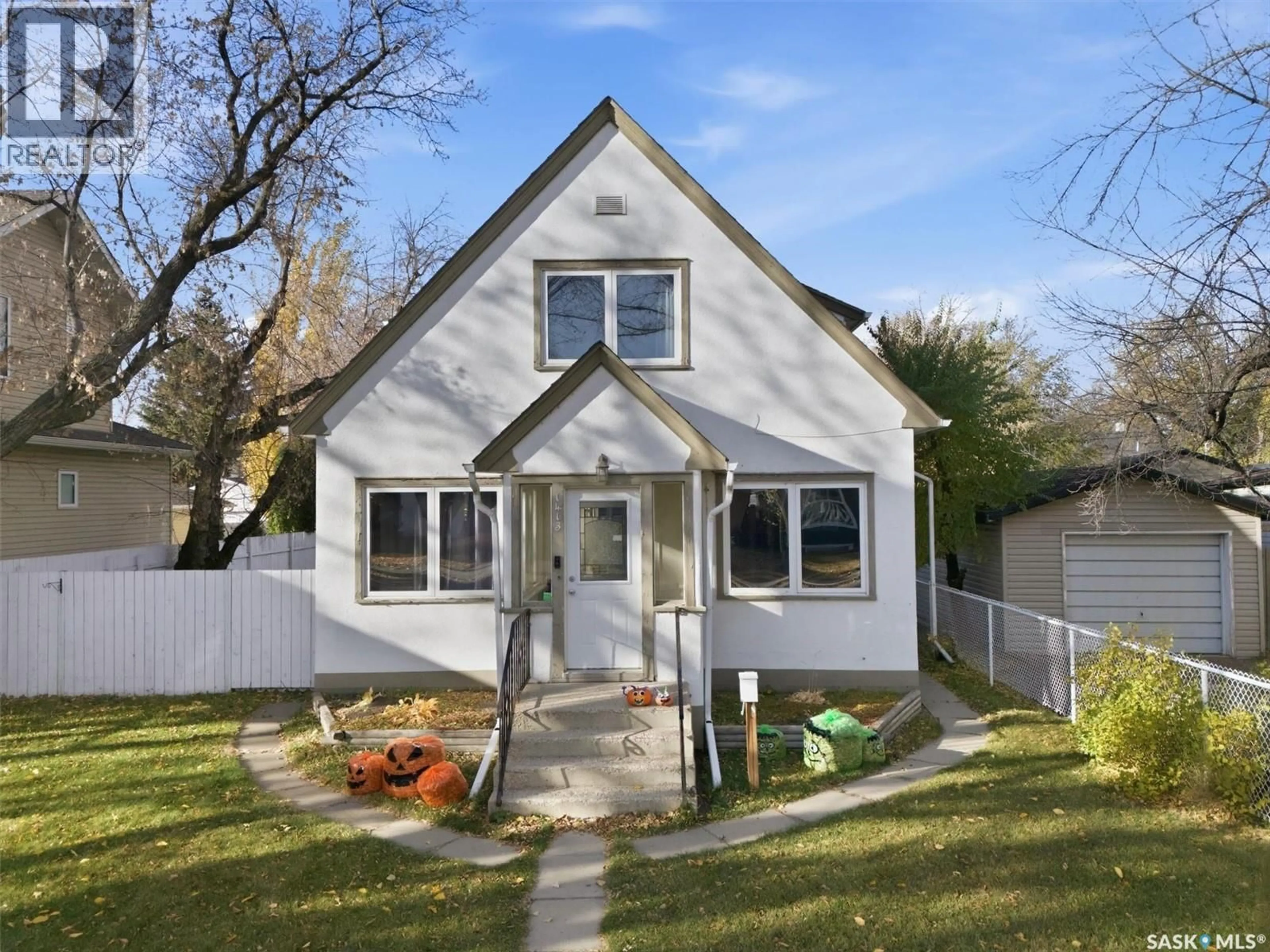 Home with vinyl exterior material, street for 1413 ALEXANDRA AVENUE, Saskatoon Saskatchewan S7K3B8