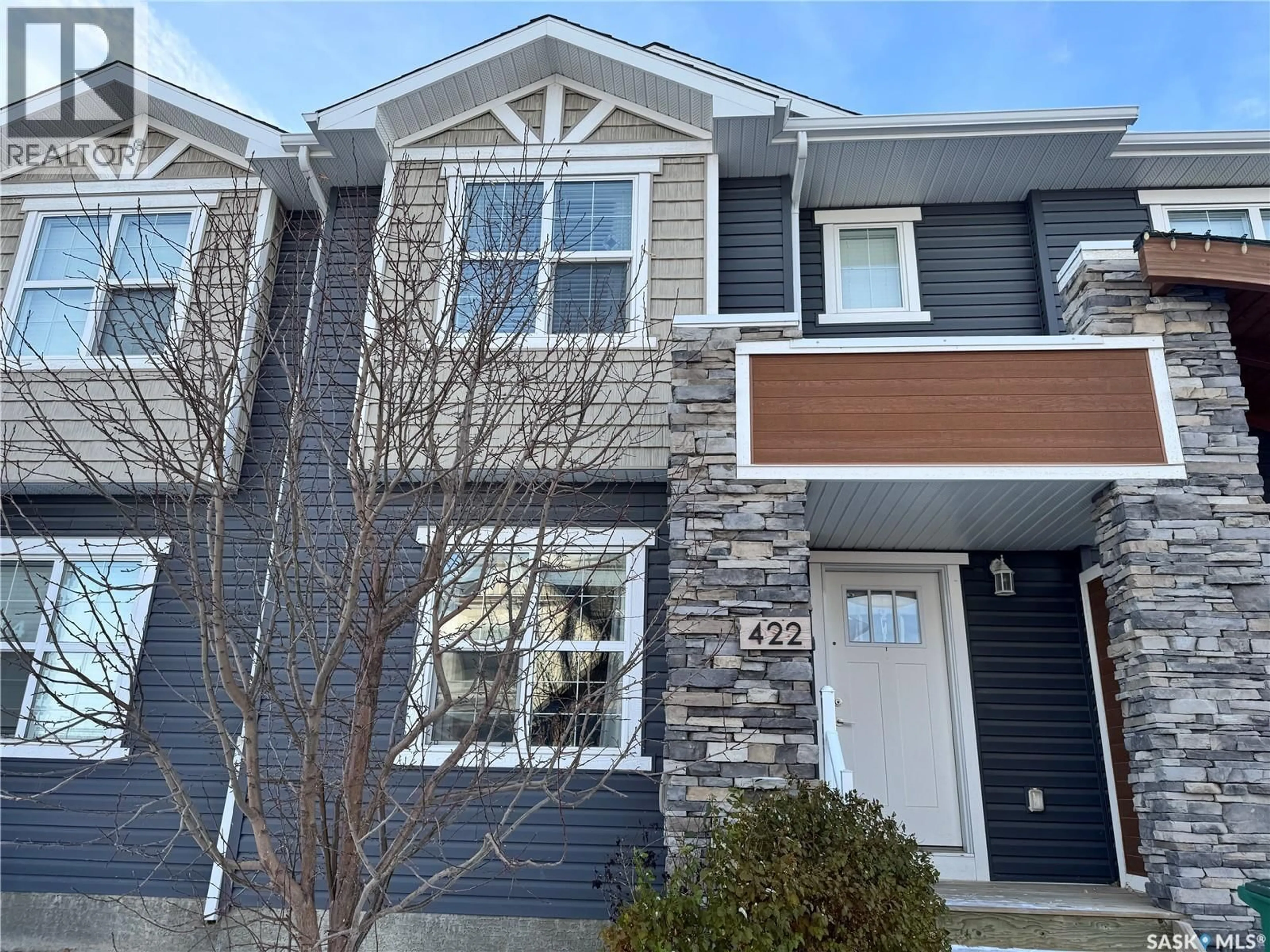 Home with vinyl exterior material, street for 422 UNDERHILL ROAD, Saskatoon Saskatchewan S7V0V4