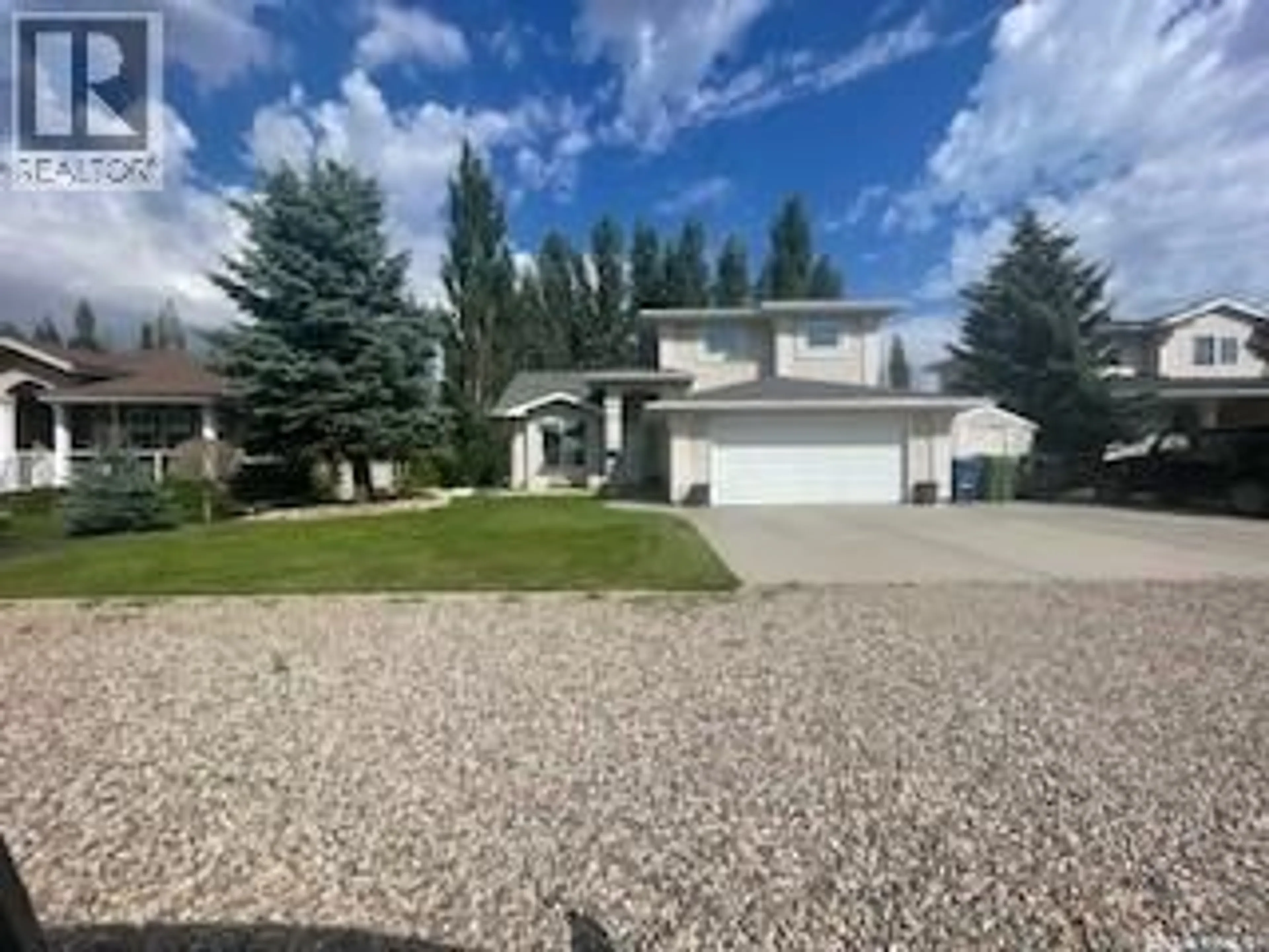 A pic from outside/outdoor area/front of a property/back of a property/a pic from drone, street for 509 MEADOW ROAD, Pilot Butte Saskatchewan S0G3Z0