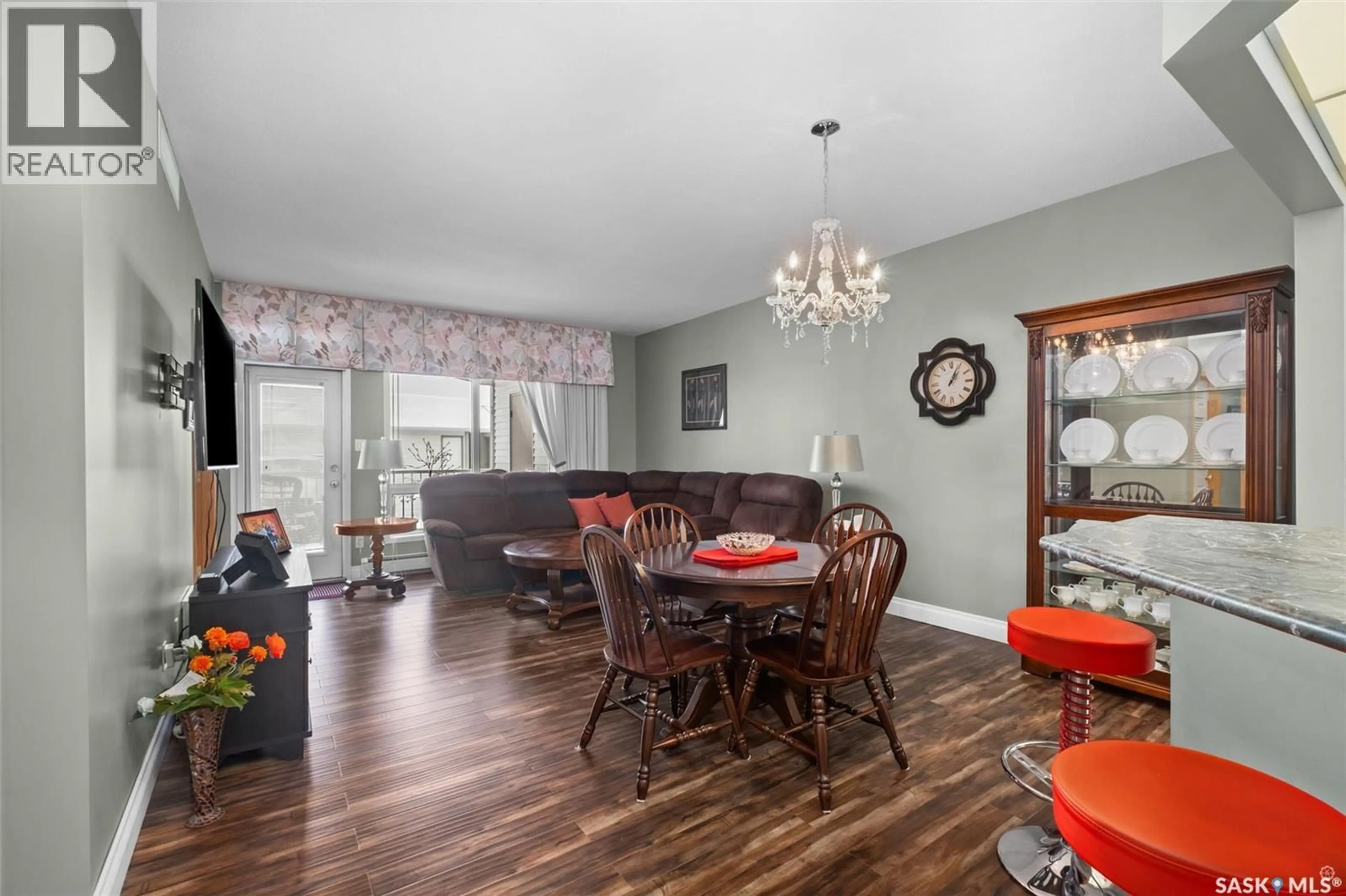 Dining room, wood/laminate floor for 101 - 3590 4TH AVENUE, Prince Albert Saskatchewan S6V8B4