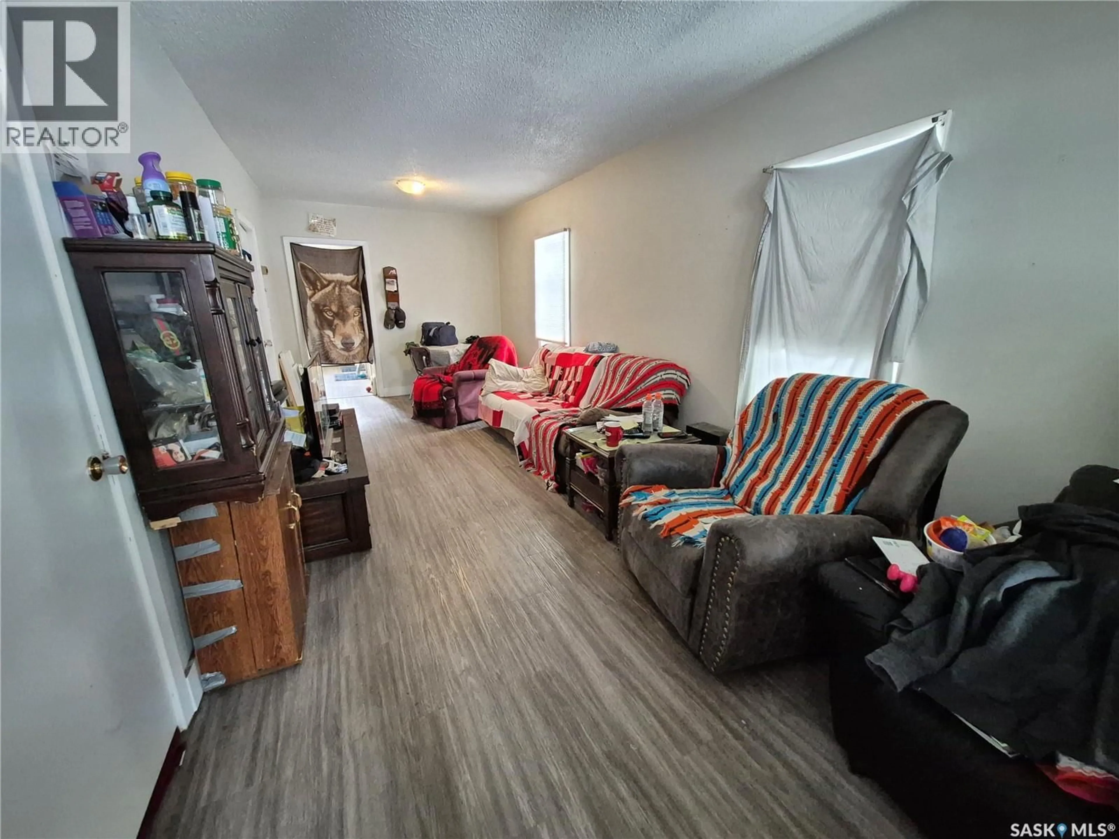 Living room with furniture, unknown for 212 7TH STREET, Weyburn Saskatchewan S4H1C4