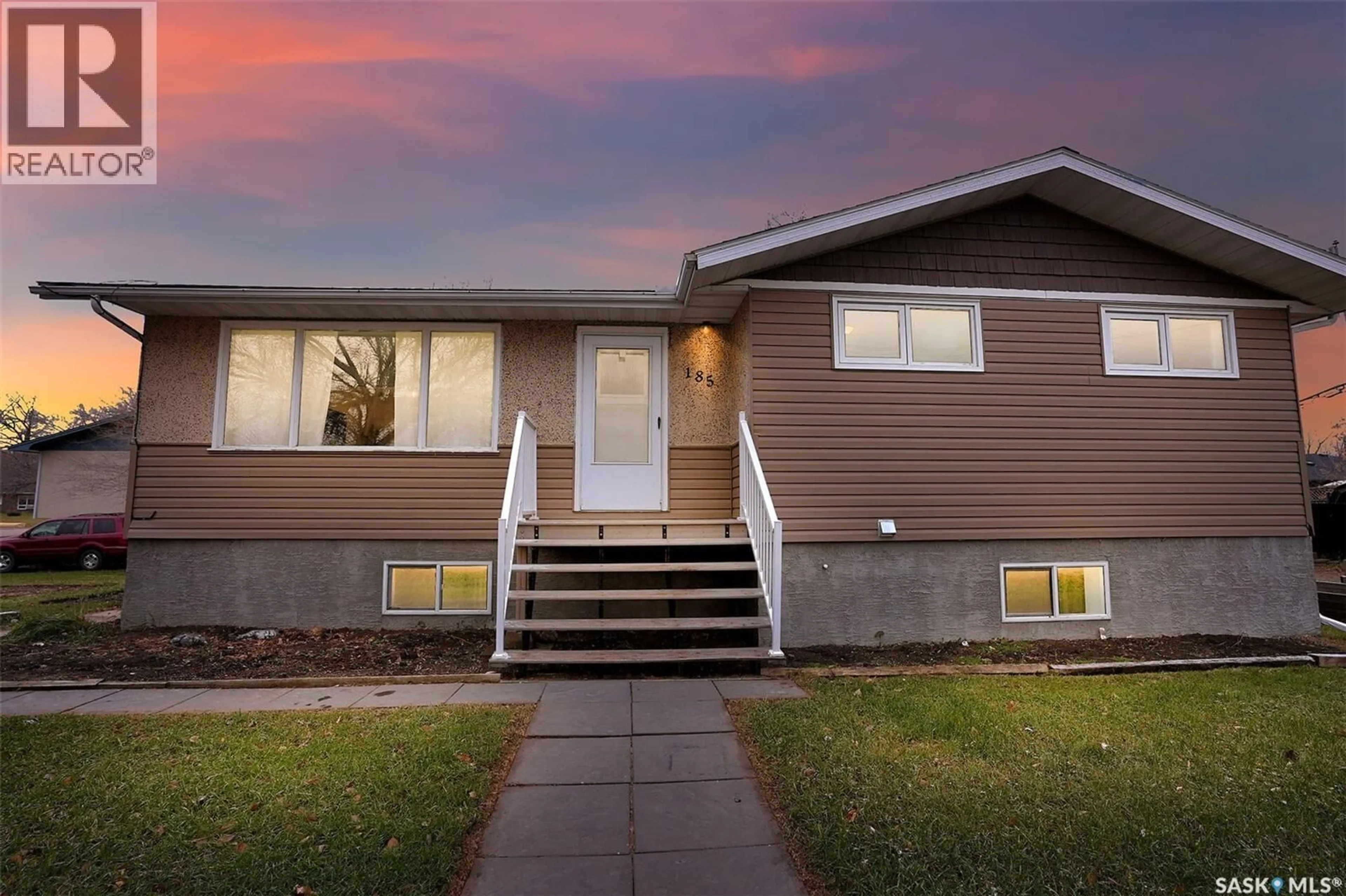 Home with vinyl exterior material, street for 185 2ND AVENUE, Lumsden Saskatchewan S0G3C0