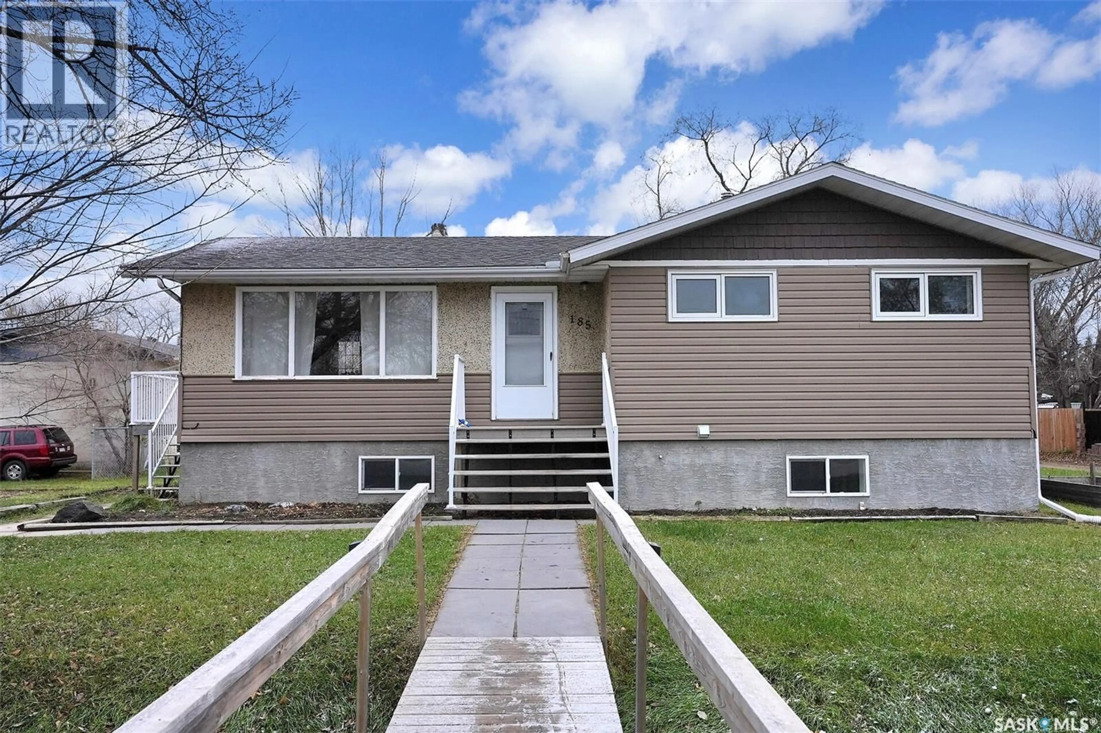 Home with vinyl exterior material, street for 185 2ND AVENUE, Lumsden Saskatchewan S0G3C0