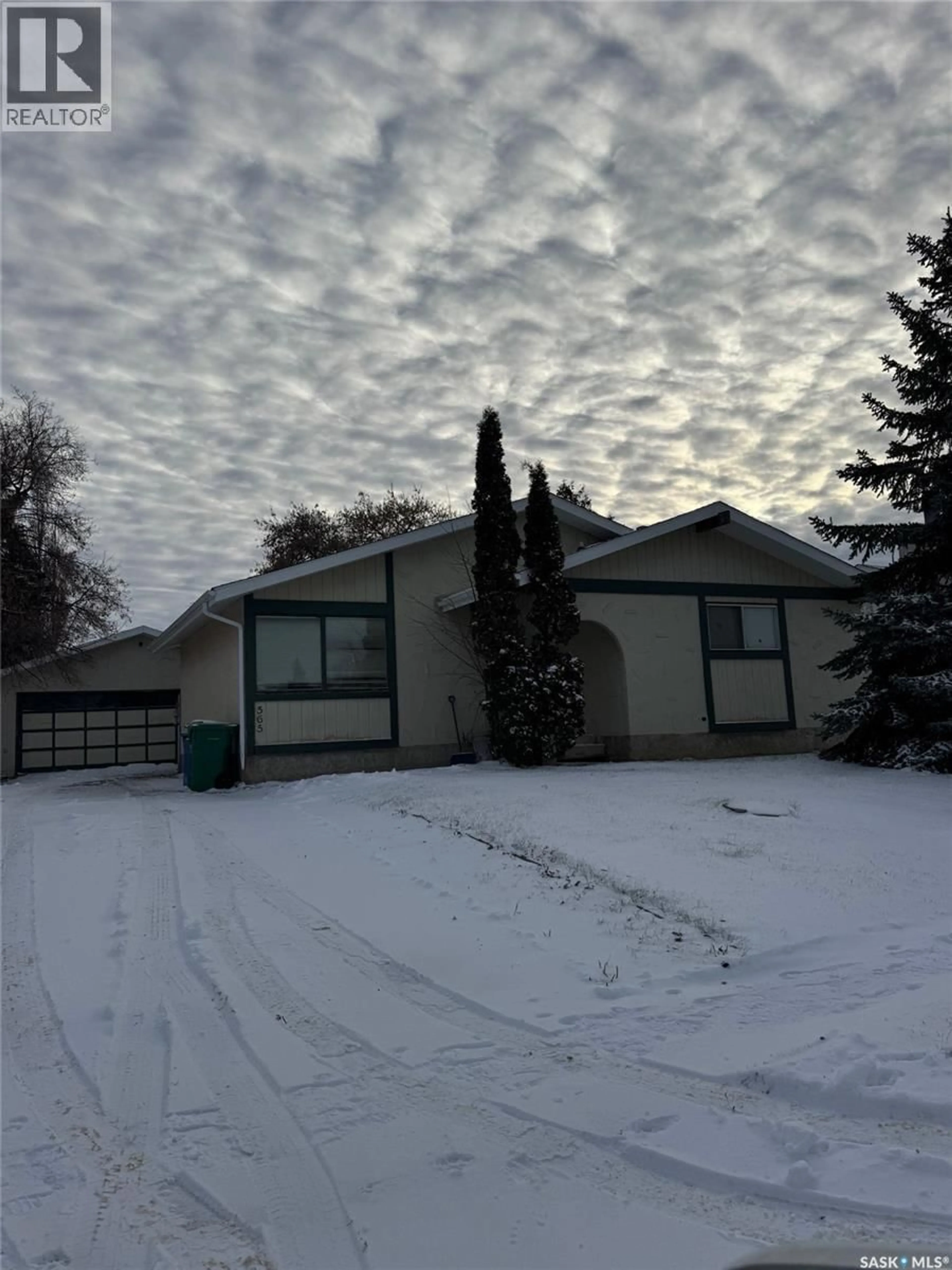 A pic from outside/outdoor area/front of a property/back of a property/a pic from drone, street for 565 32ND STREET, Prince Albert Saskatchewan S6V6B7