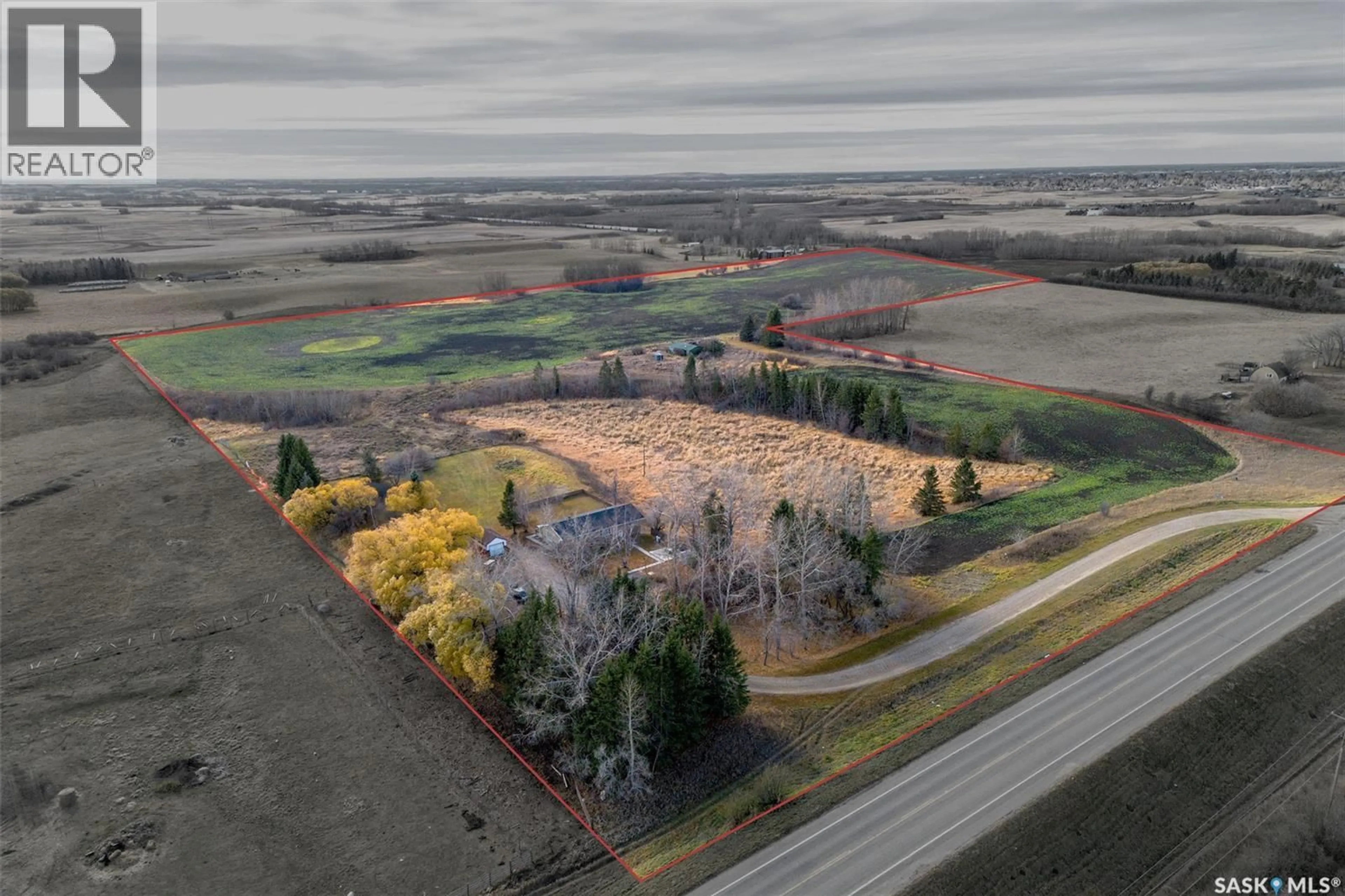 A pic from outside/outdoor area/front of a property/back of a property/a pic from drone, forest/trees view for Acreage - 15108 HIGHWAY 302 EAST, Prince Albert Rm No. 461 Saskatchewan S6V7H8