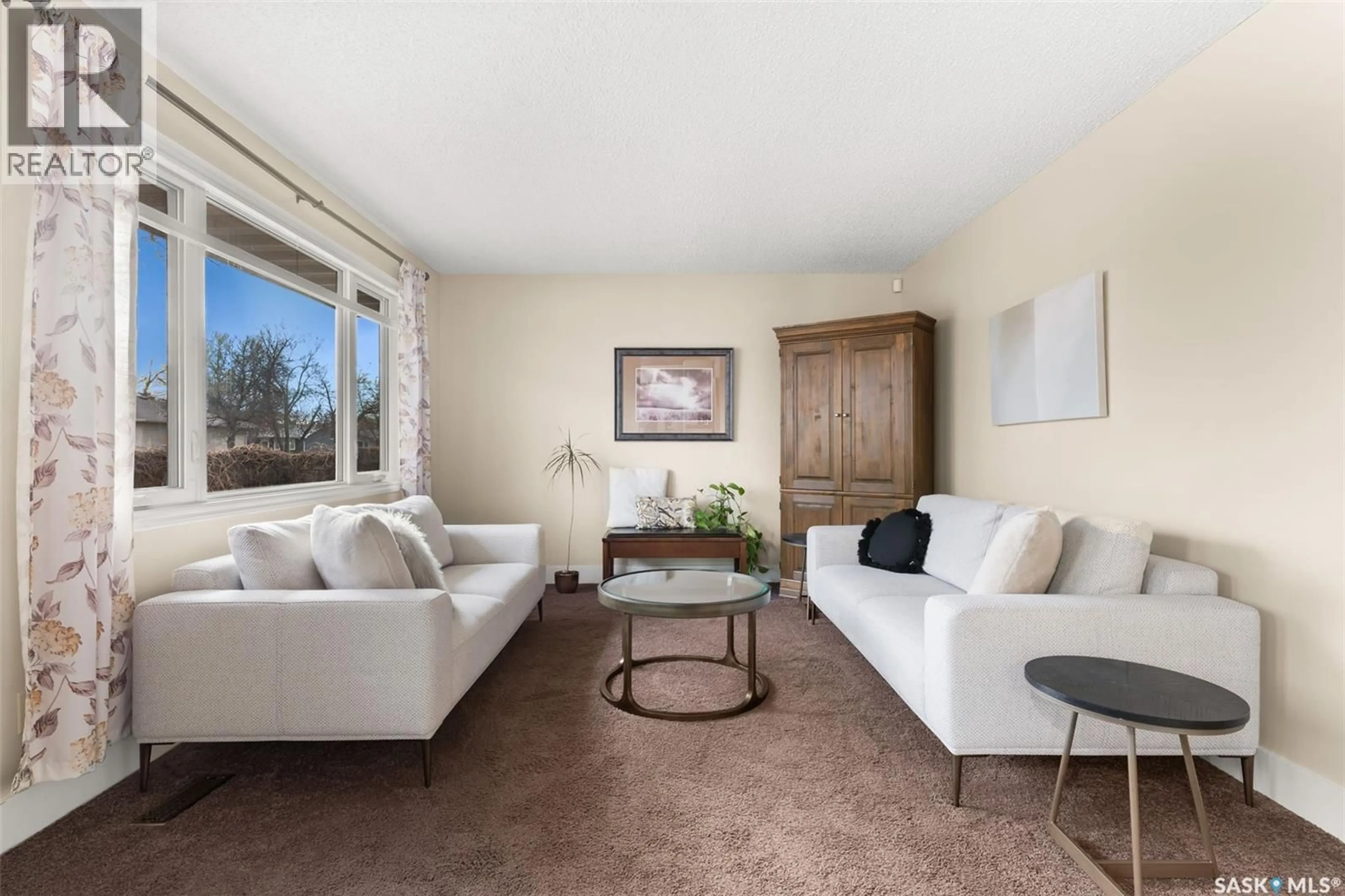 Living room with furniture, unknown for 58 FYFE STREET, Regina Saskatchewan S4X1W6