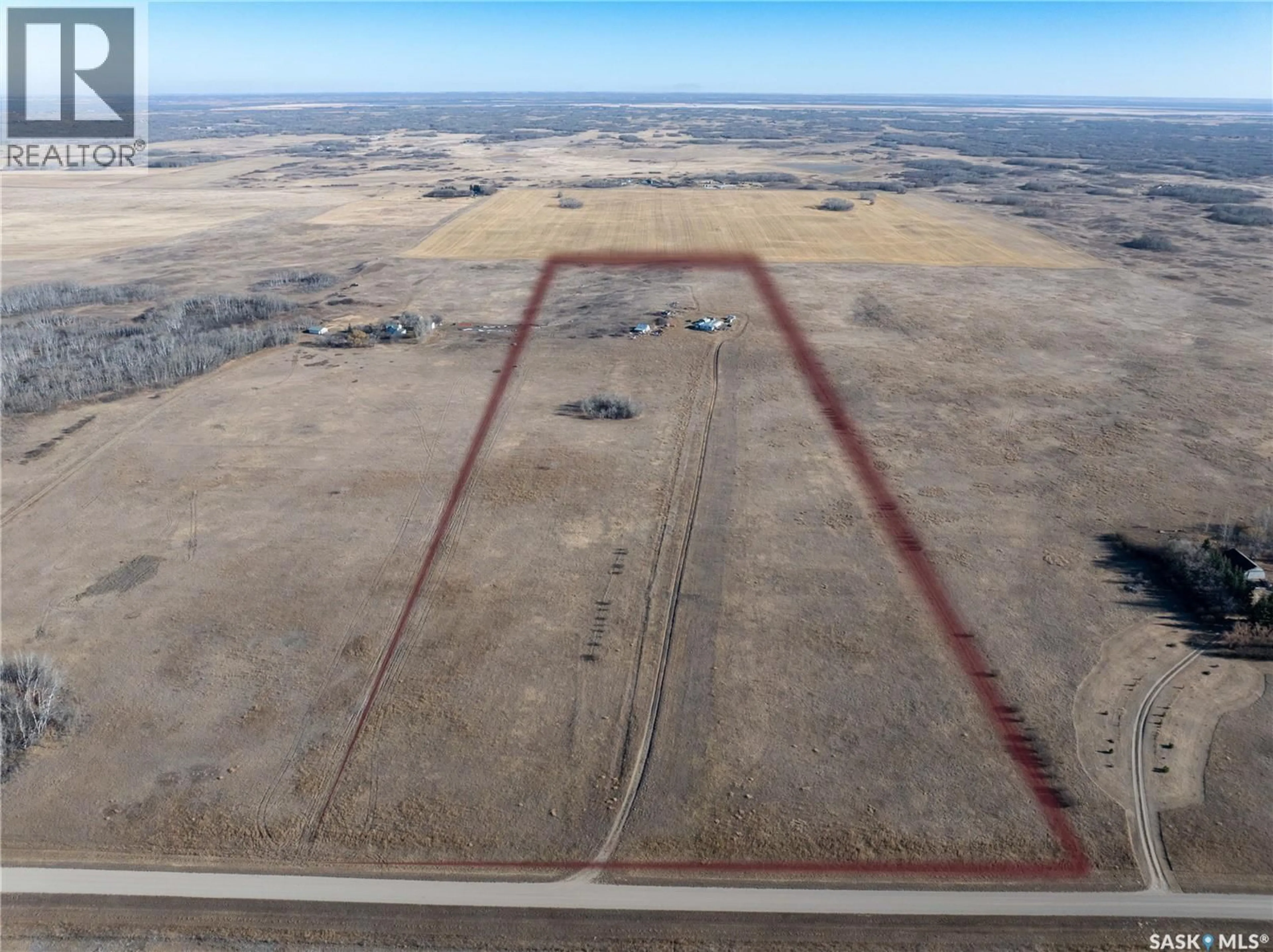 A pic from outside/outdoor area/front of a property/back of a property/a pic from drone, building for -04 - 34 NW 3, Vanscoy Rm No. 345 Saskatchewan S0L3J0