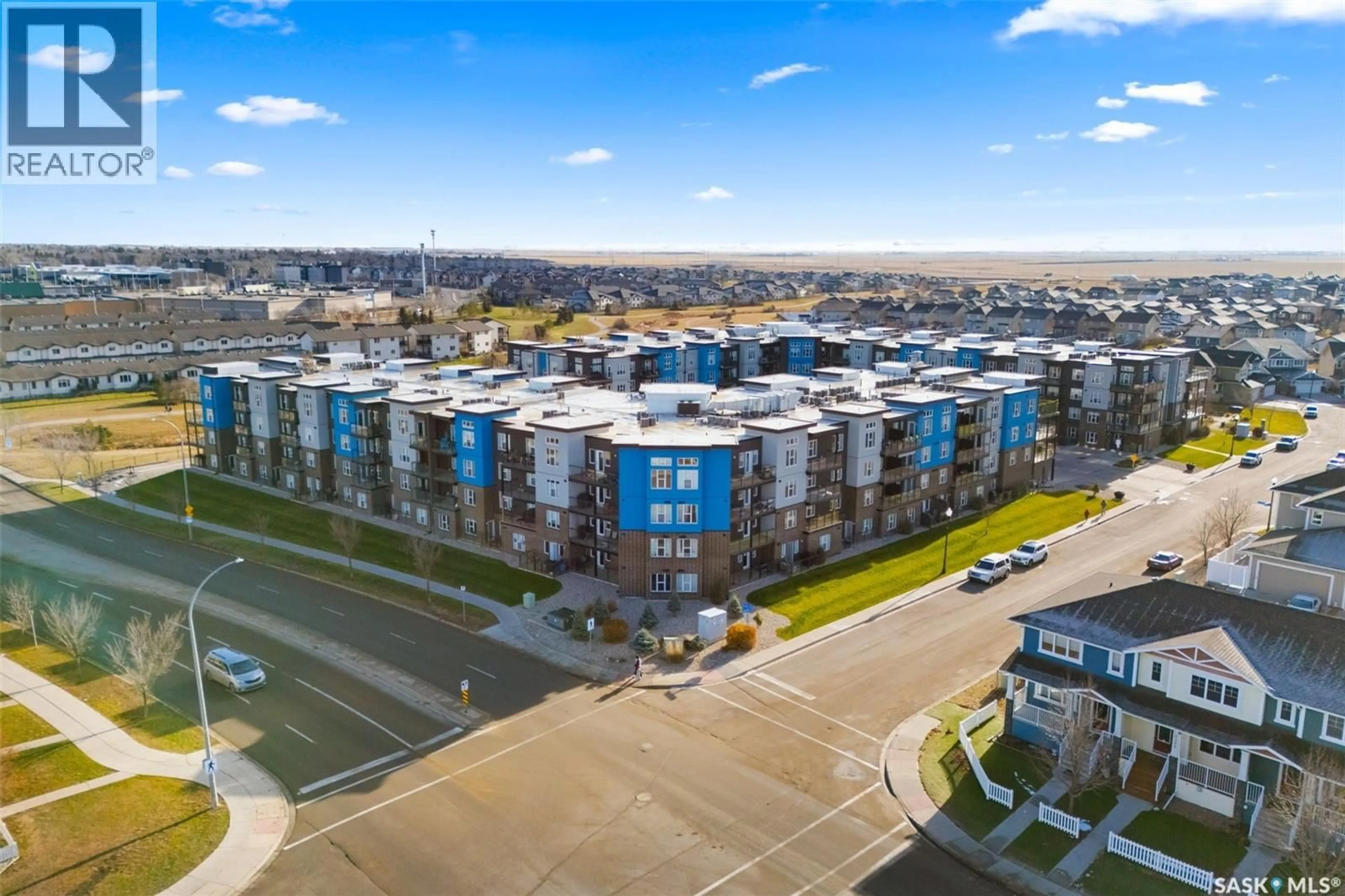 A pic from outside/outdoor area/front of a property/back of a property/a pic from drone, city buildings view from balcony for 103 - 5303 UNIVERSAL CRESCENT, Regina Saskatchewan S4W0L1