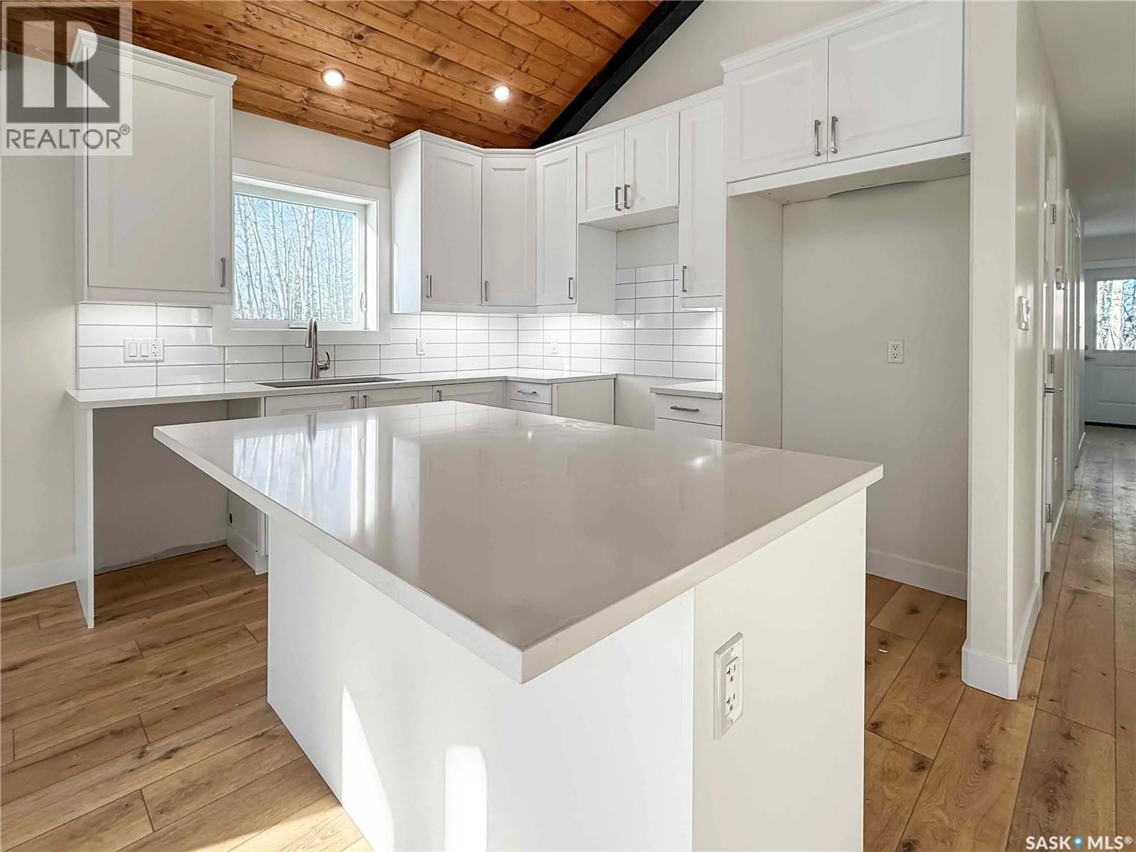 Open concept kitchen, wood/laminate floor for 20 VALLEY RIDGE ROAD, Candle Lake Saskatchewan S0J3E0