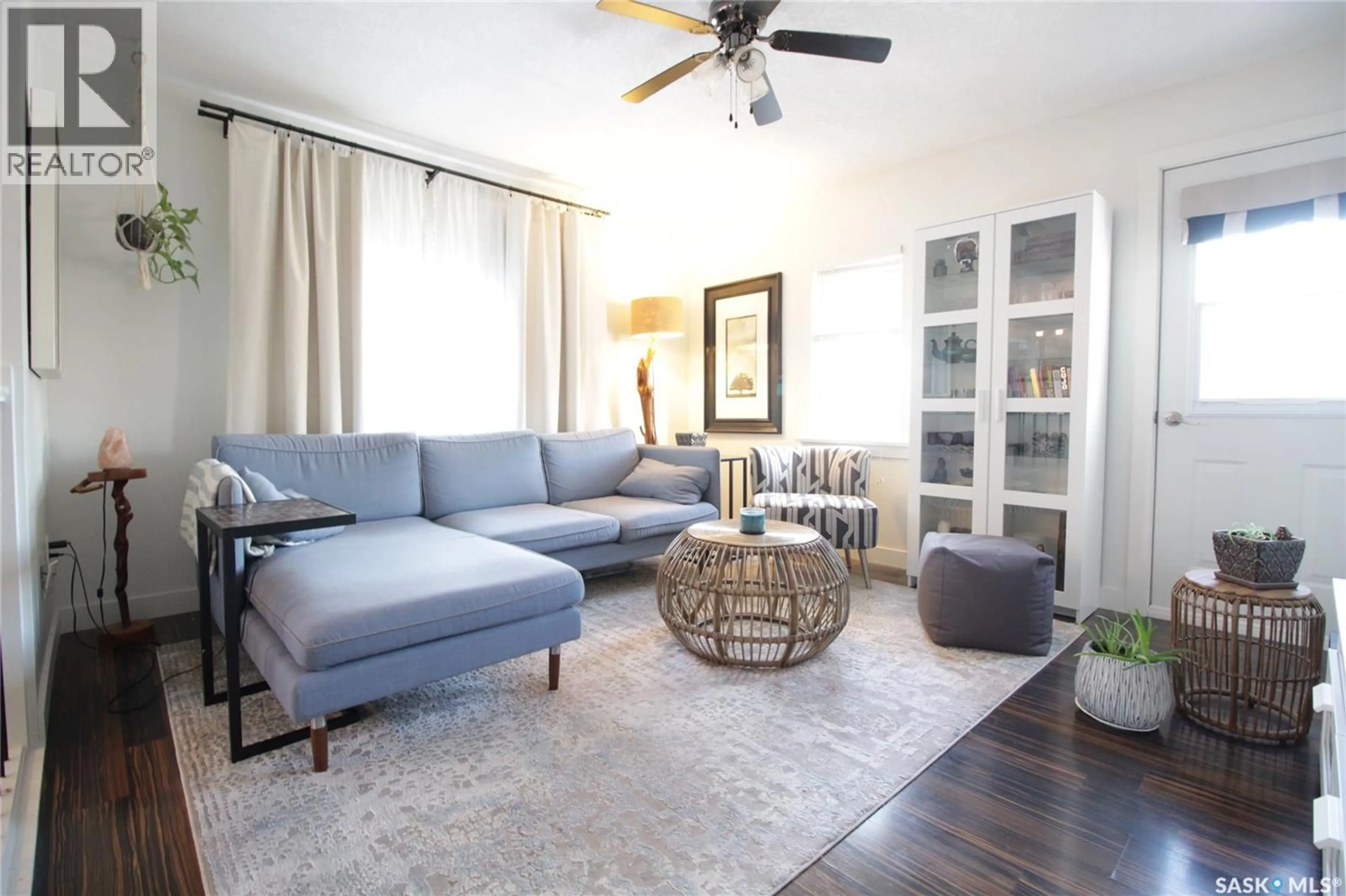 Living room with furniture, wood/laminate floor for 217 GARRY STREET, Rocanville Saskatchewan S0A3L0