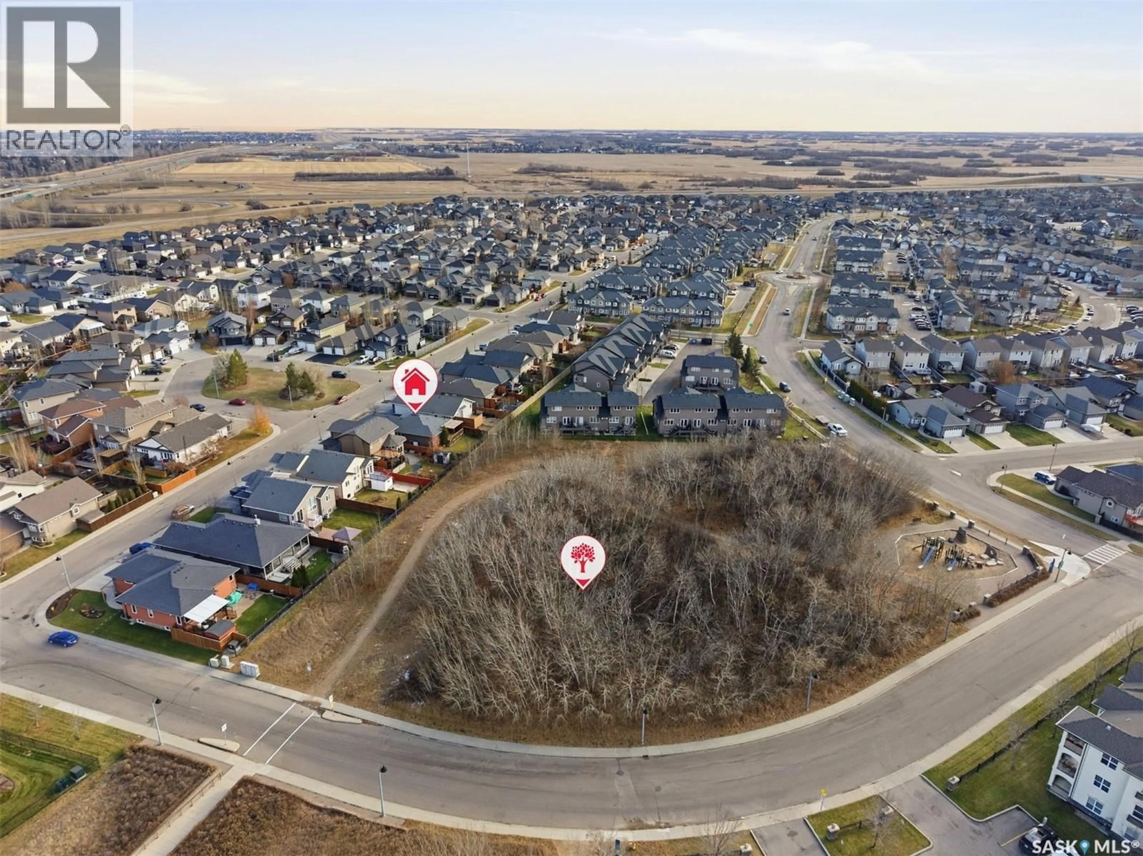 A pic from outside/outdoor area/front of a property/back of a property/a pic from drone, street for 223 REMPEL LANE, Saskatoon Saskatchewan S7T0J3