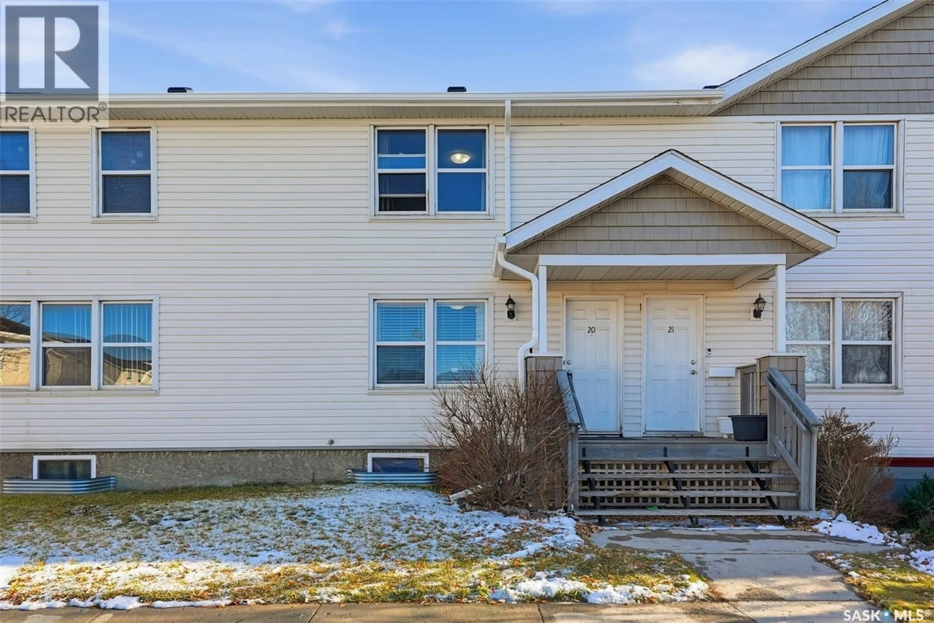 Home with vinyl exterior material, street for 20 209 CAMPONI PLACE, Saskatoon Saskatchewan S7M1E9