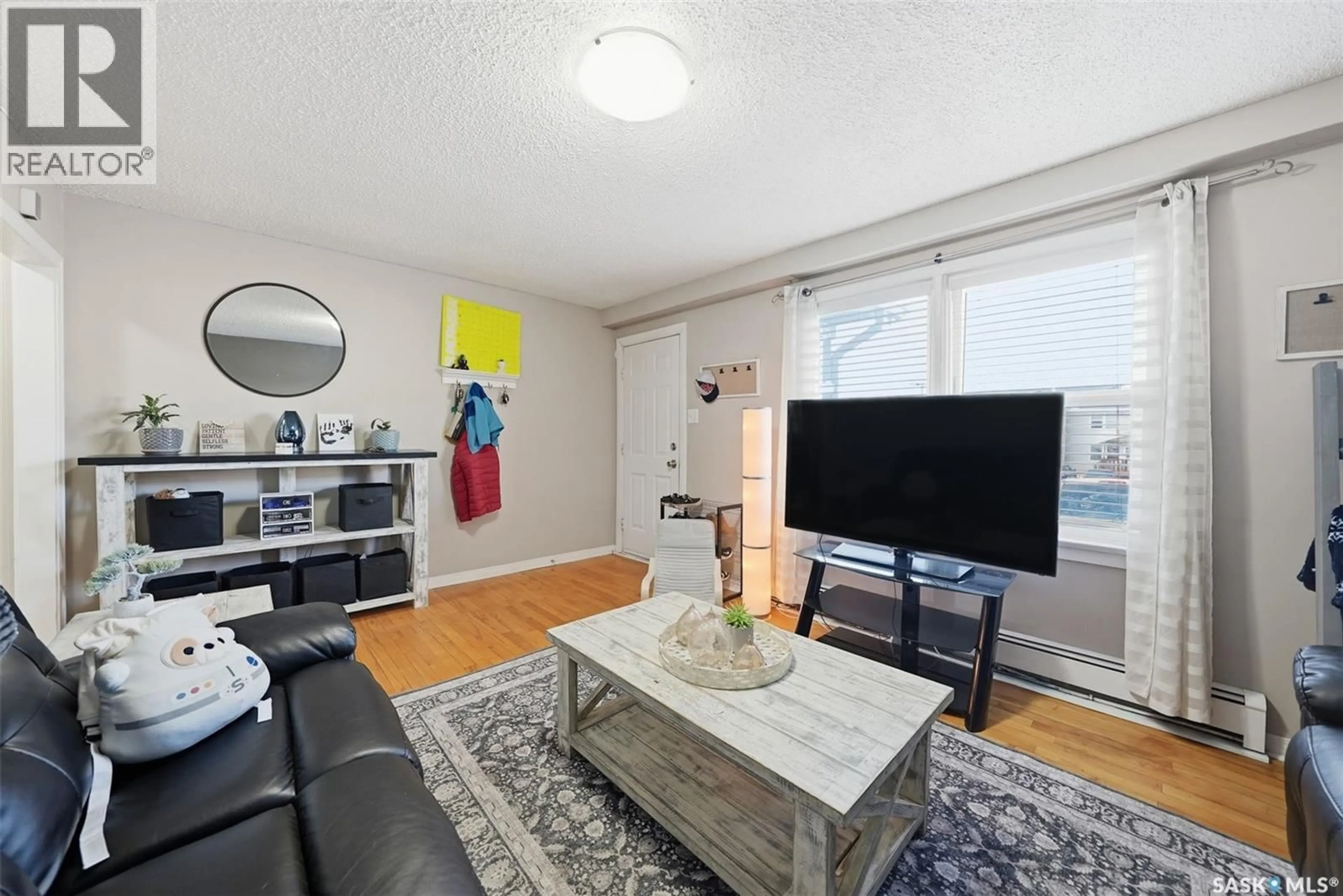 Living room with furniture, unknown for 20 209 CAMPONI PLACE, Saskatoon Saskatchewan S7M1E9