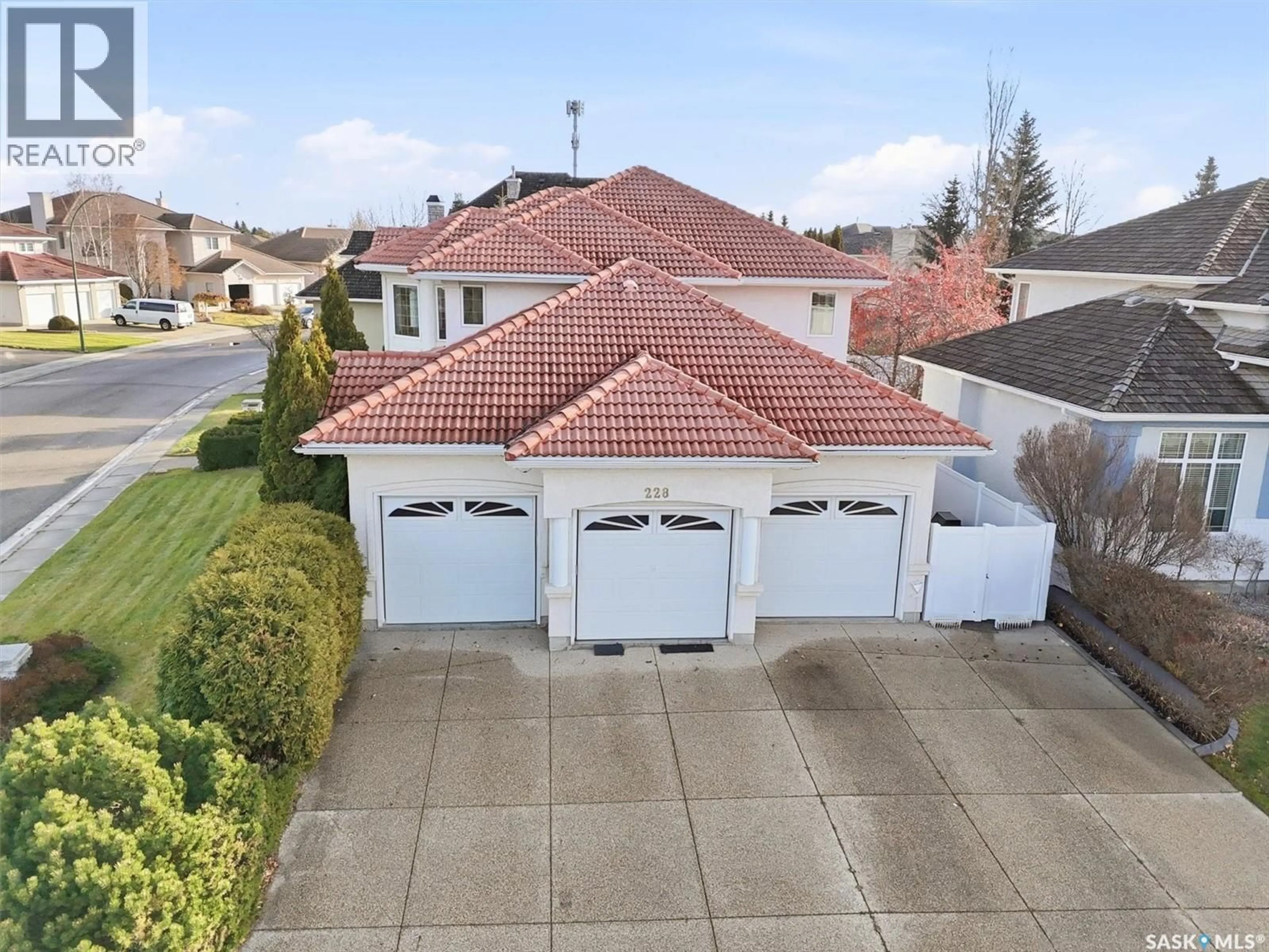 A pic from outside/outdoor area/front of a property/back of a property/a pic from drone, street for 228 BRAESHIRE LANE, Saskatoon Saskatchewan S7V1B2