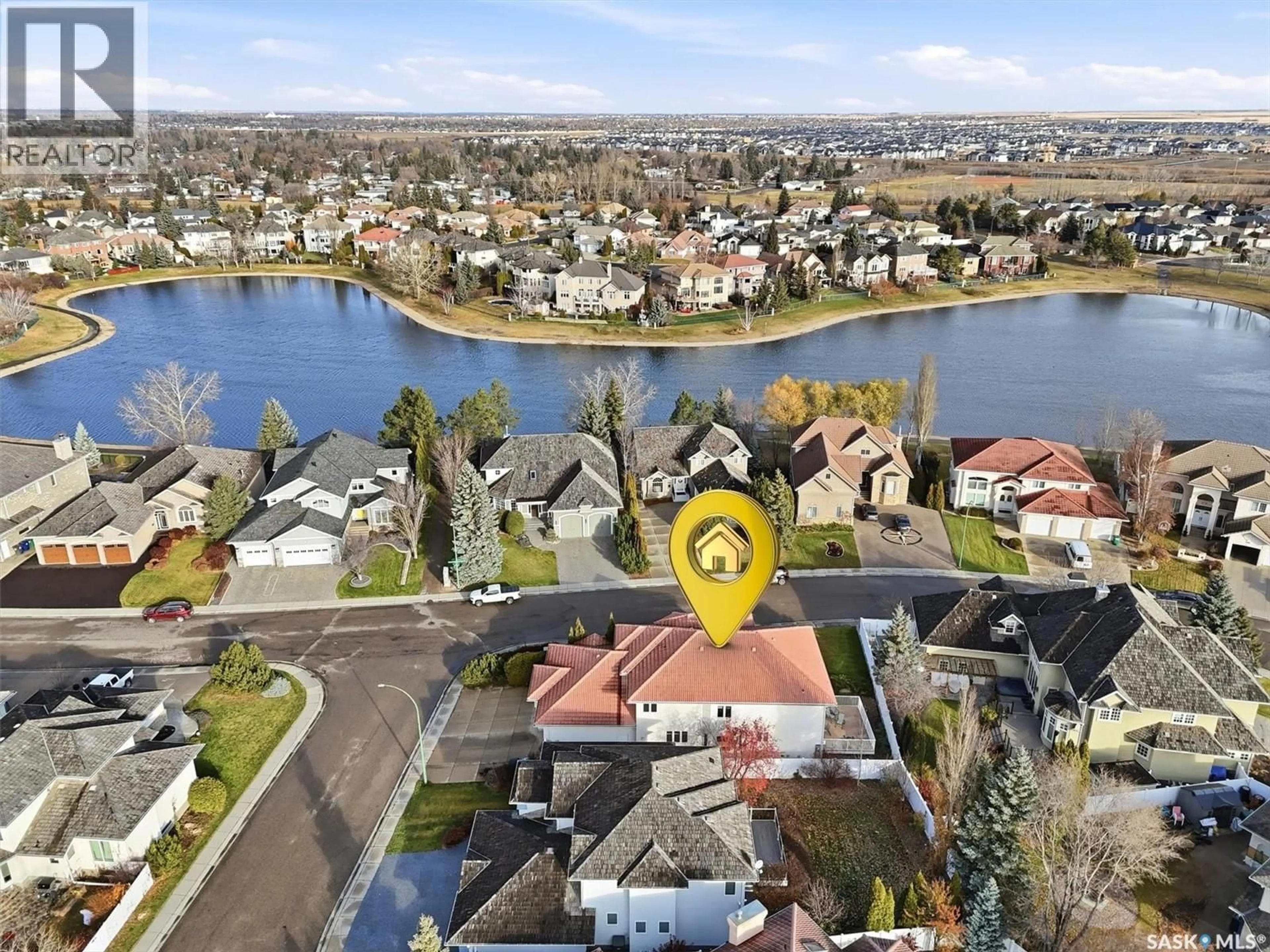 A pic from outside/outdoor area/front of a property/back of a property/a pic from drone, water/lake/river/ocean view for 228 BRAESHIRE LANE, Saskatoon Saskatchewan S7V1B2
