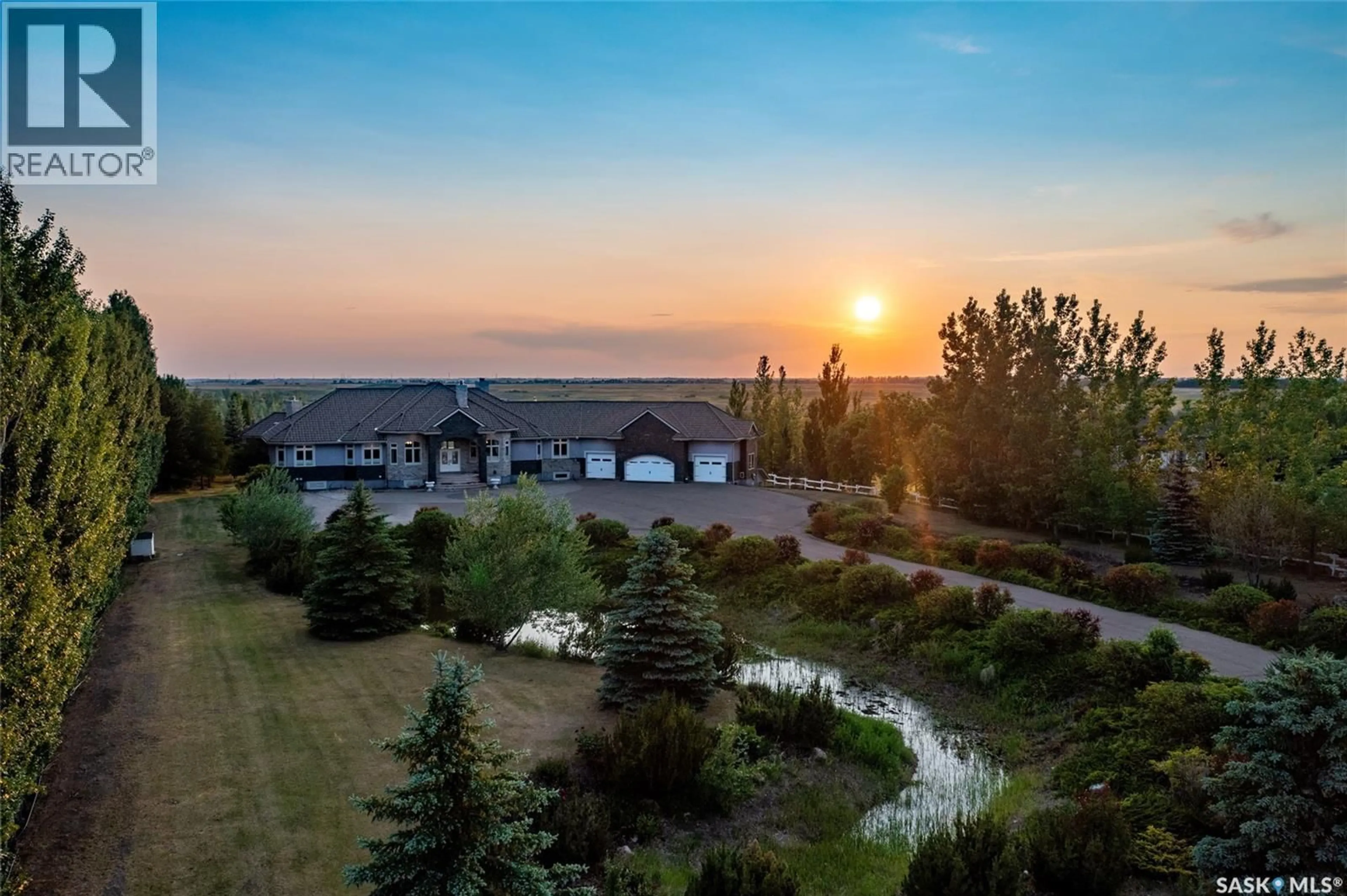 A pic from outside/outdoor area/front of a property/back of a property/a pic from drone, water/lake/river/ocean view for 72 RIVERS EDGE LANE, Corman Park Rm No. 344 Saskatchewan S7K3J9
