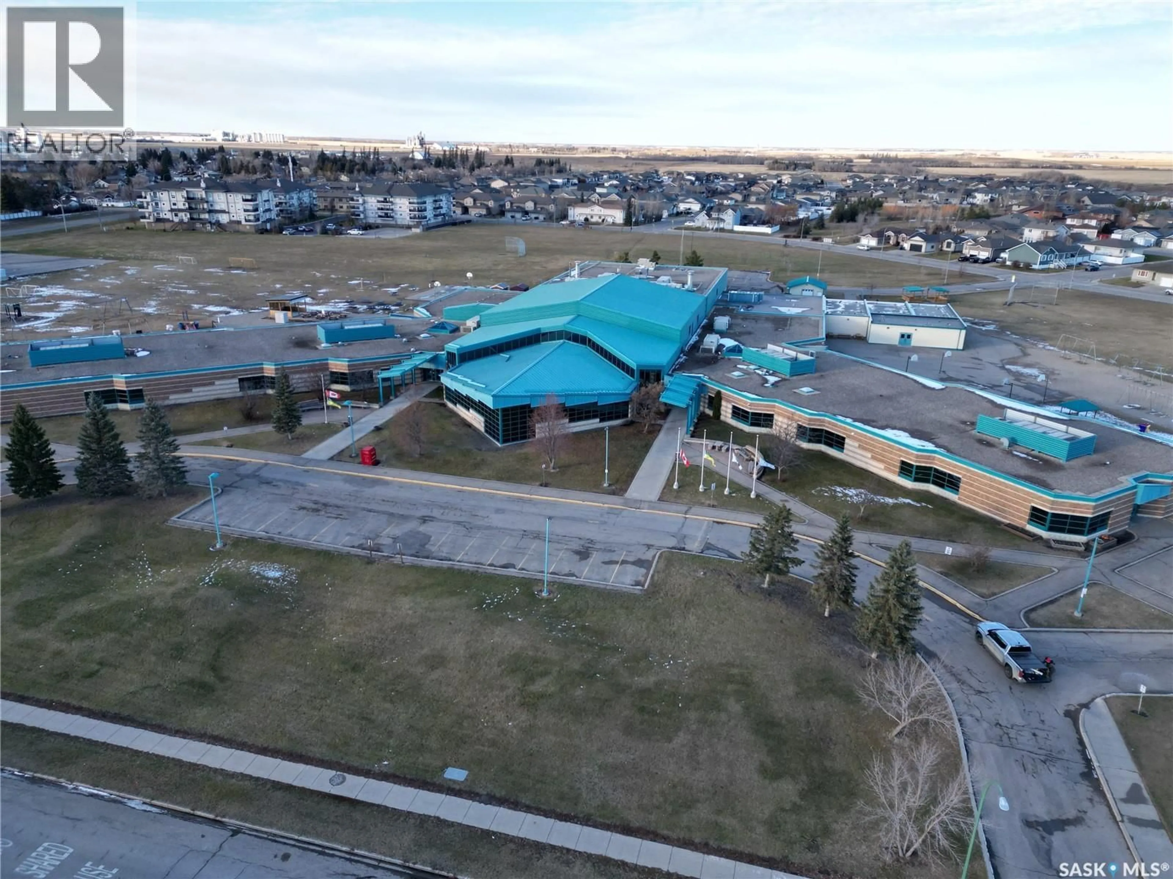 A pic from outside/outdoor area/front of a property/back of a property/a pic from drone, building for 388 DARLINGTON STREET, Yorkton Saskatchewan S3N3Y9