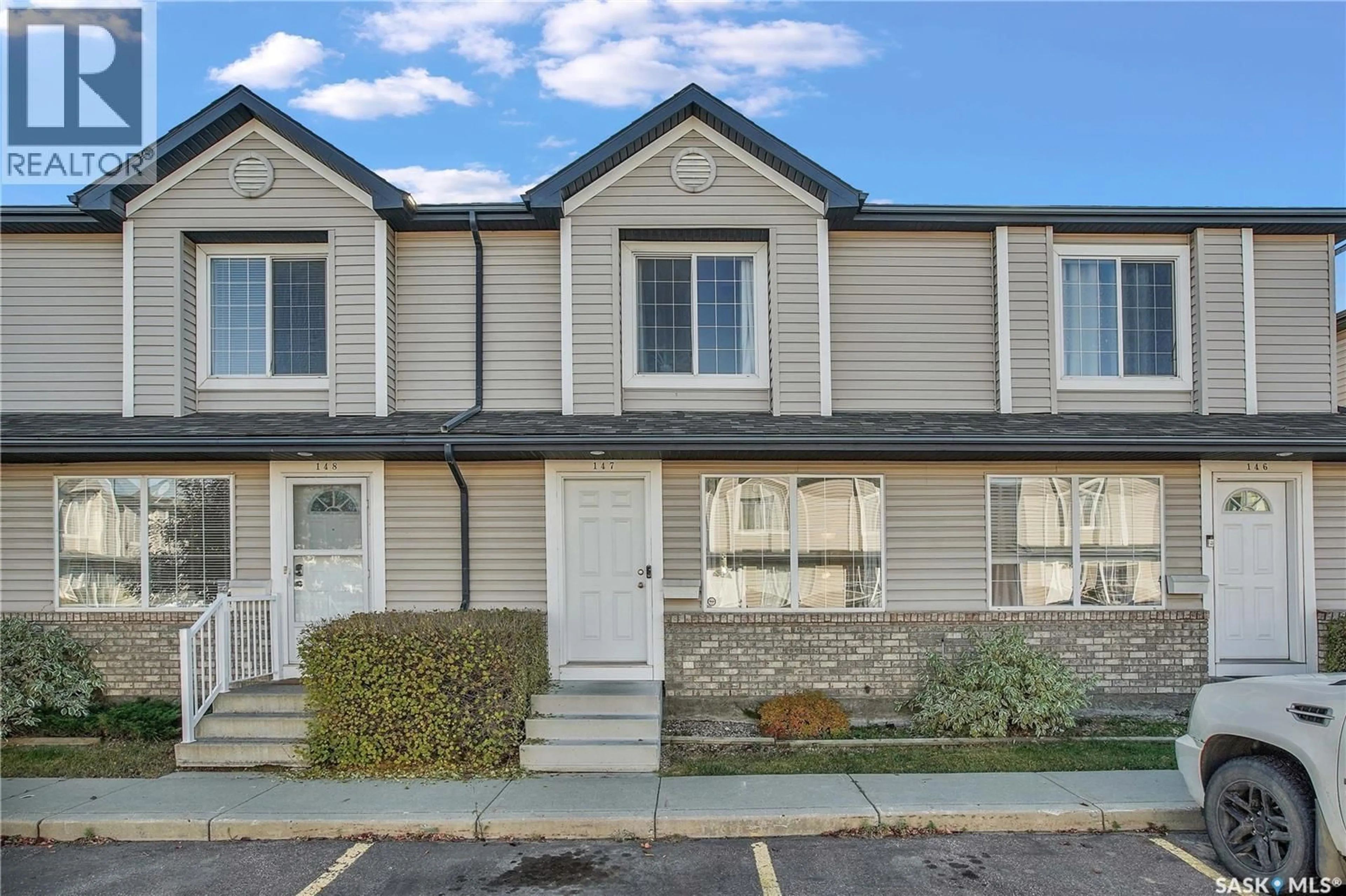 Home with vinyl exterior material, street for 147 670 KENDERDINE ROAD, Saskatoon Saskatchewan S7N4W4