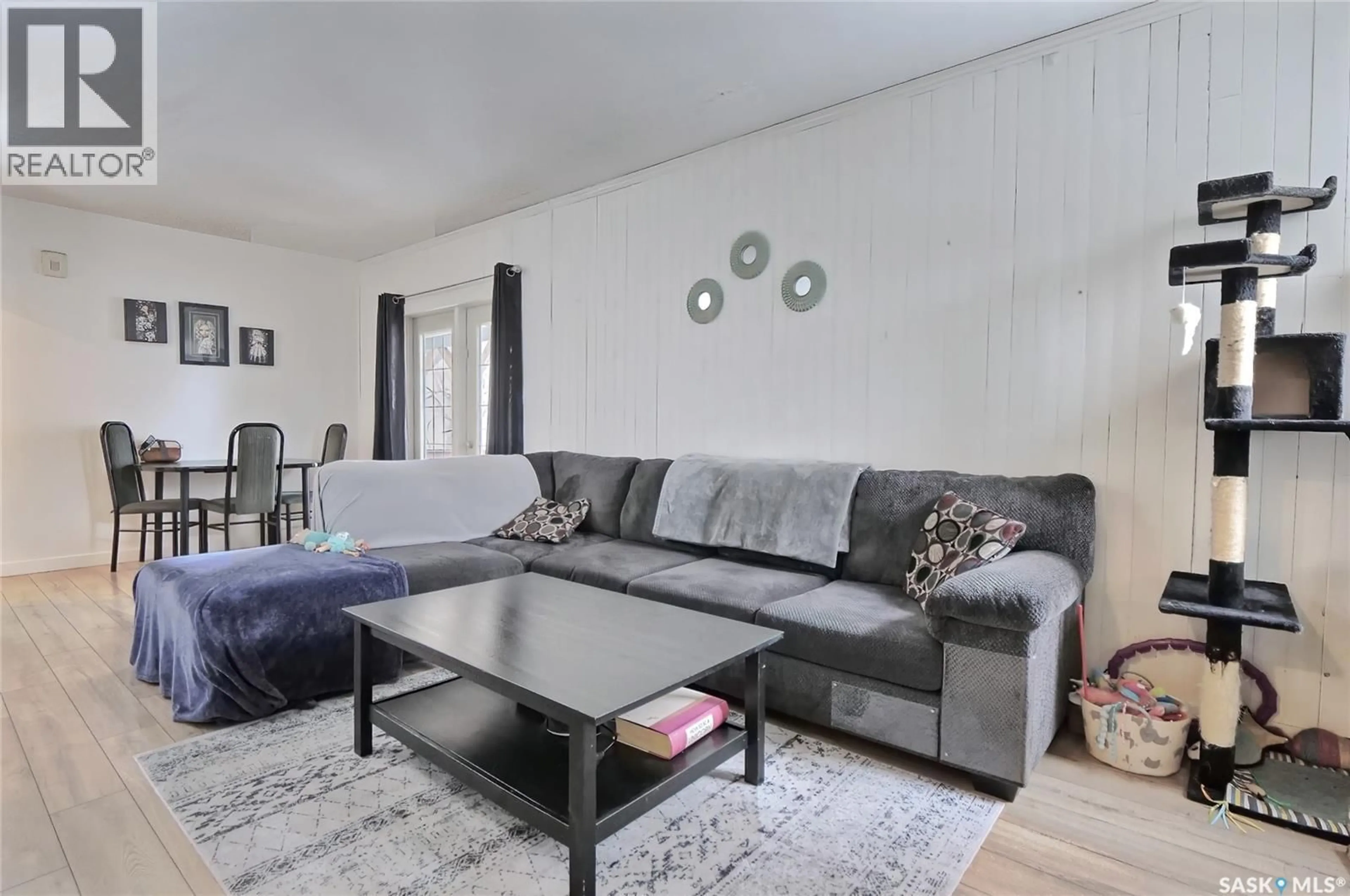 Living room with furniture, unknown for 142 HOCHELAGA STREET, Moose Jaw Saskatchewan S6H2G3