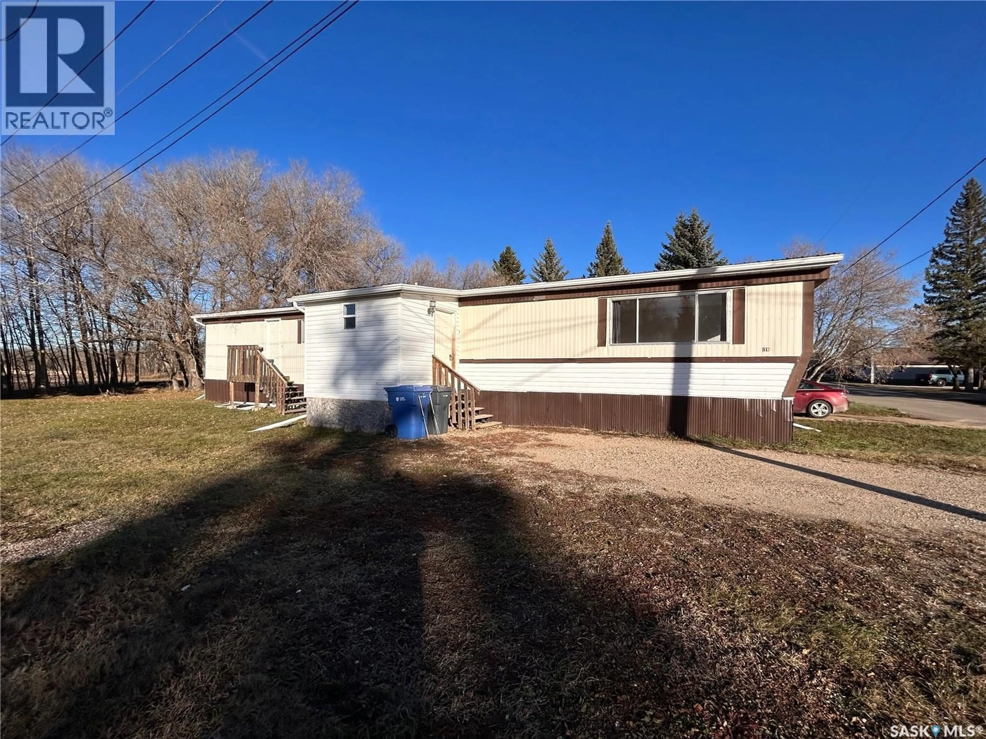 A pic from outside/outdoor area/front of a property/back of a property/a pic from drone, street for 211 RAILWAY AVENUE, Wawota Saskatchewan S0G5A0