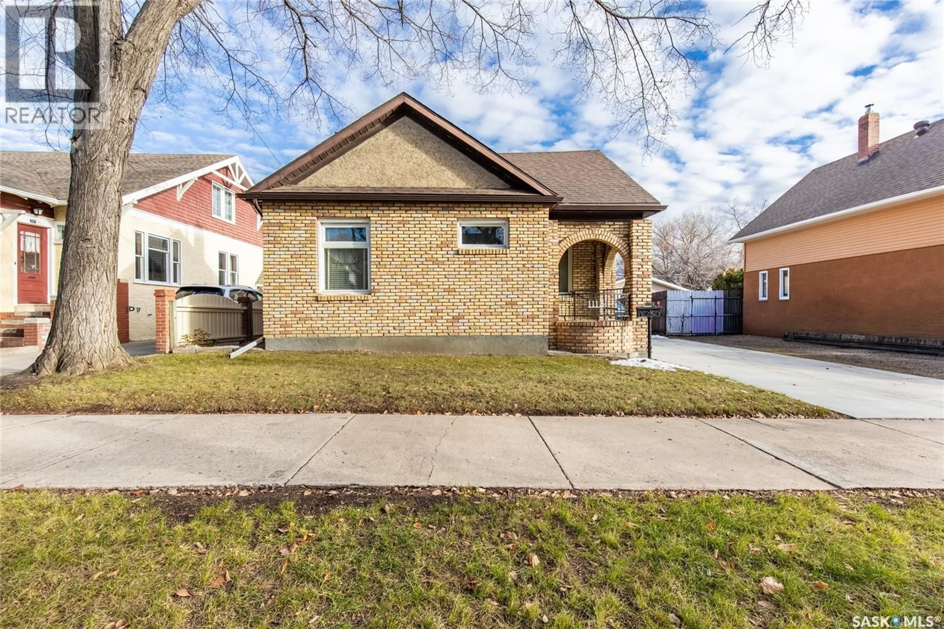 Home with brick exterior material, street for 1113 2ND AVENUE, Moose Jaw Saskatchewan S6H3R4