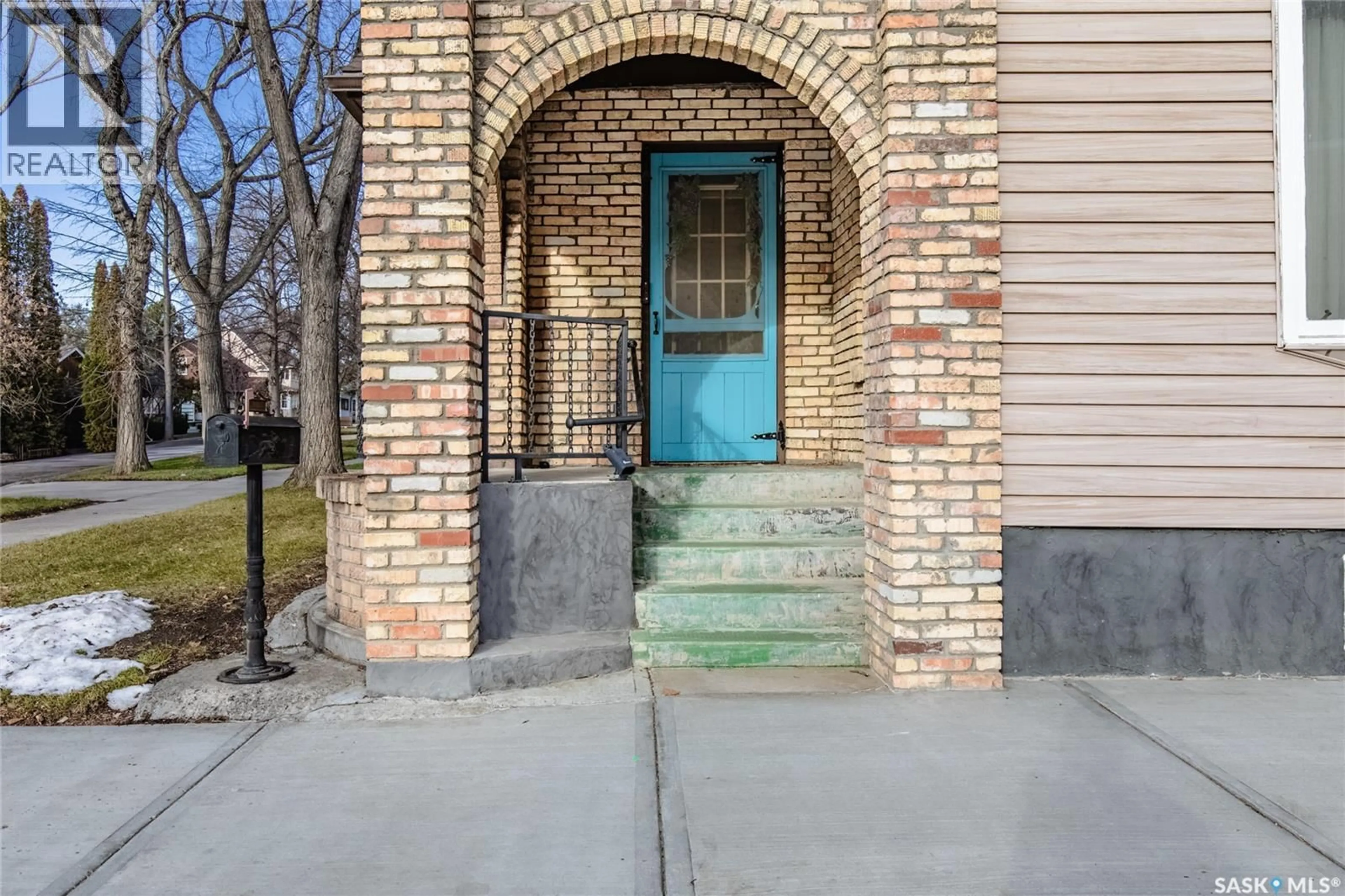Home with brick exterior material, street for 1113 2ND AVENUE, Moose Jaw Saskatchewan S6H3R4